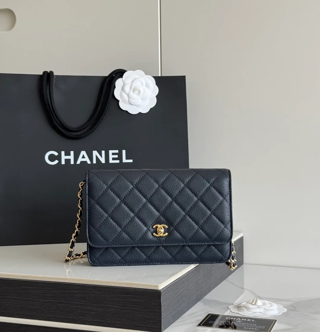 Chanel Calfskin Quilted Clutch in Black · view 1