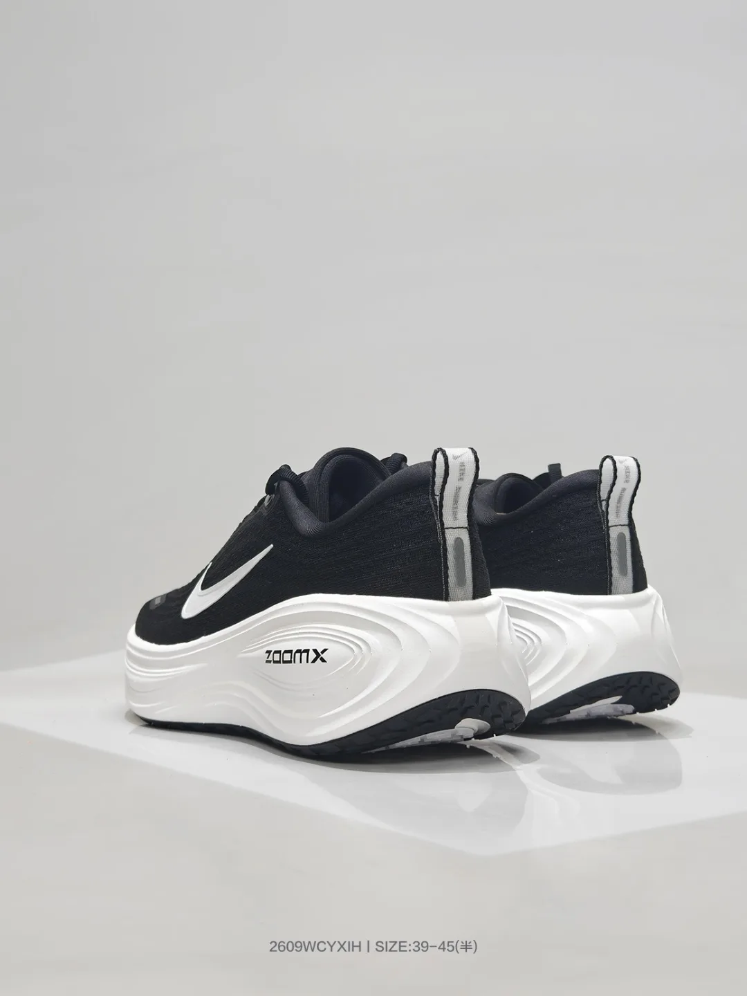 Nike ZoomX running sneakers in Black & White · view 8