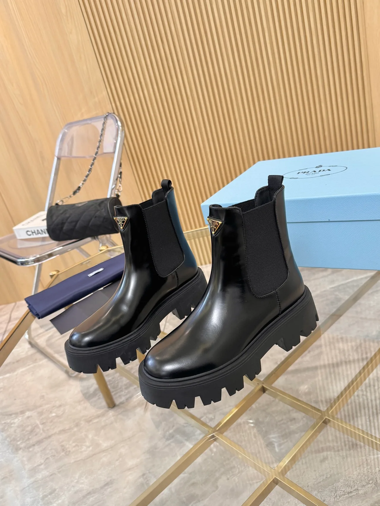 Prada Glossy Chelsea Boots in Black · view 3