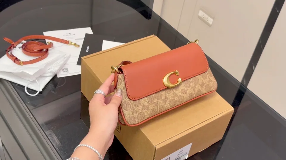 Coach Smooth Baguette Jet Shoulder Bag in Beige · view 1