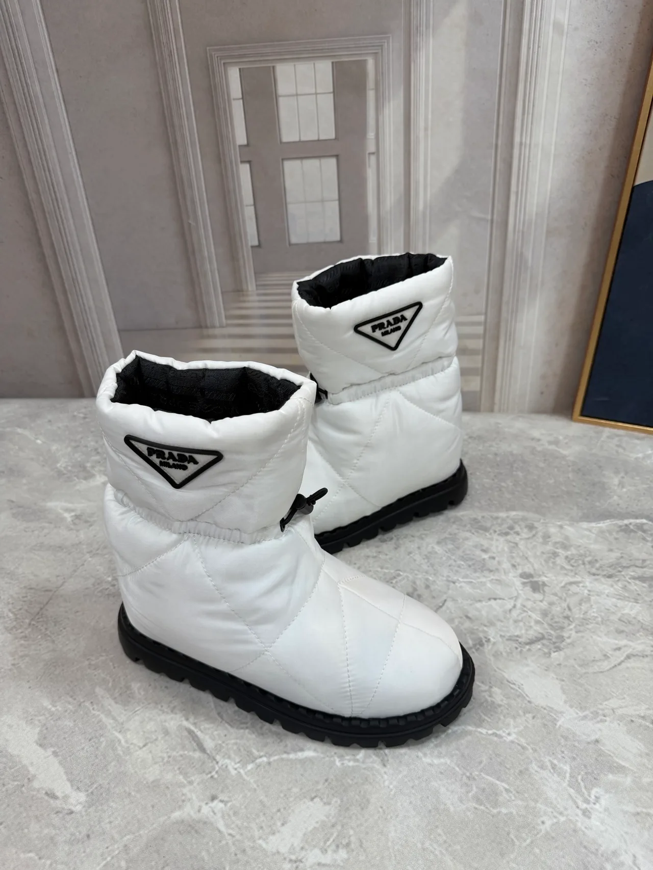 Prada Quilted Glossy Puffer Boots in White · view 3