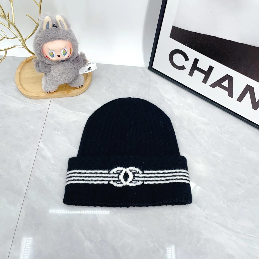Chanel Ribbed Striped Beanie in Blue · view 1