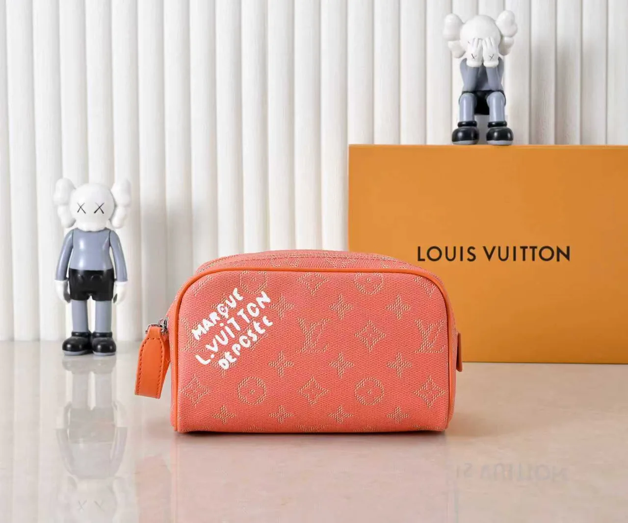 Louis Vuitton Cowhide Canvas Wash Bag in Orange · view 1