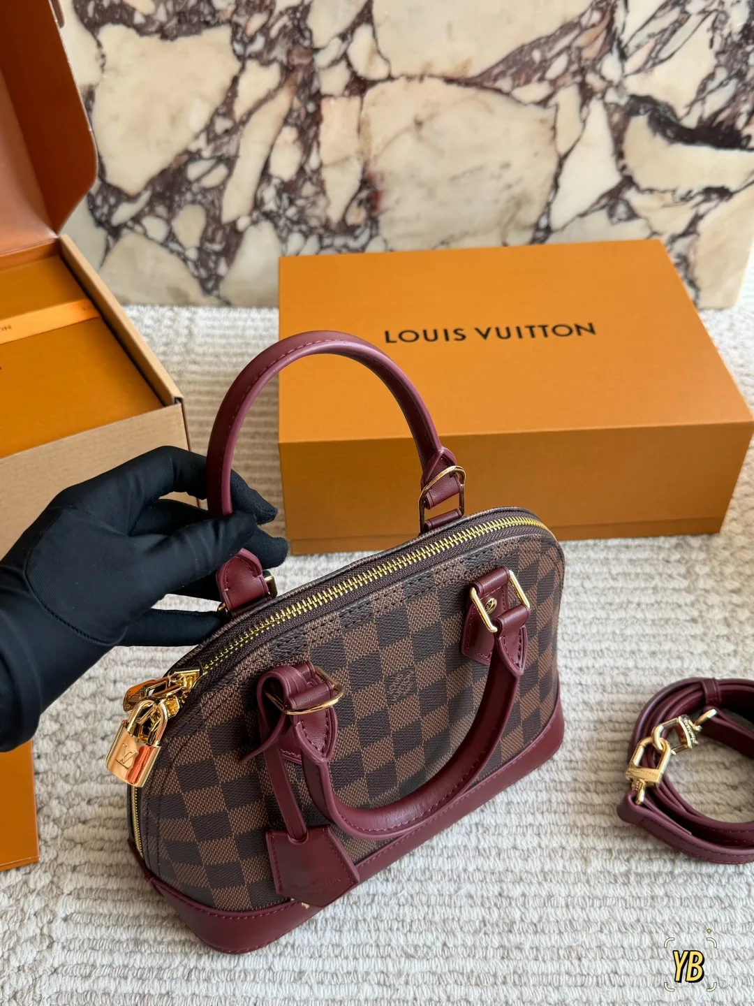 Louis Vuitton Cowhide Check Handbag in Brown · view 2