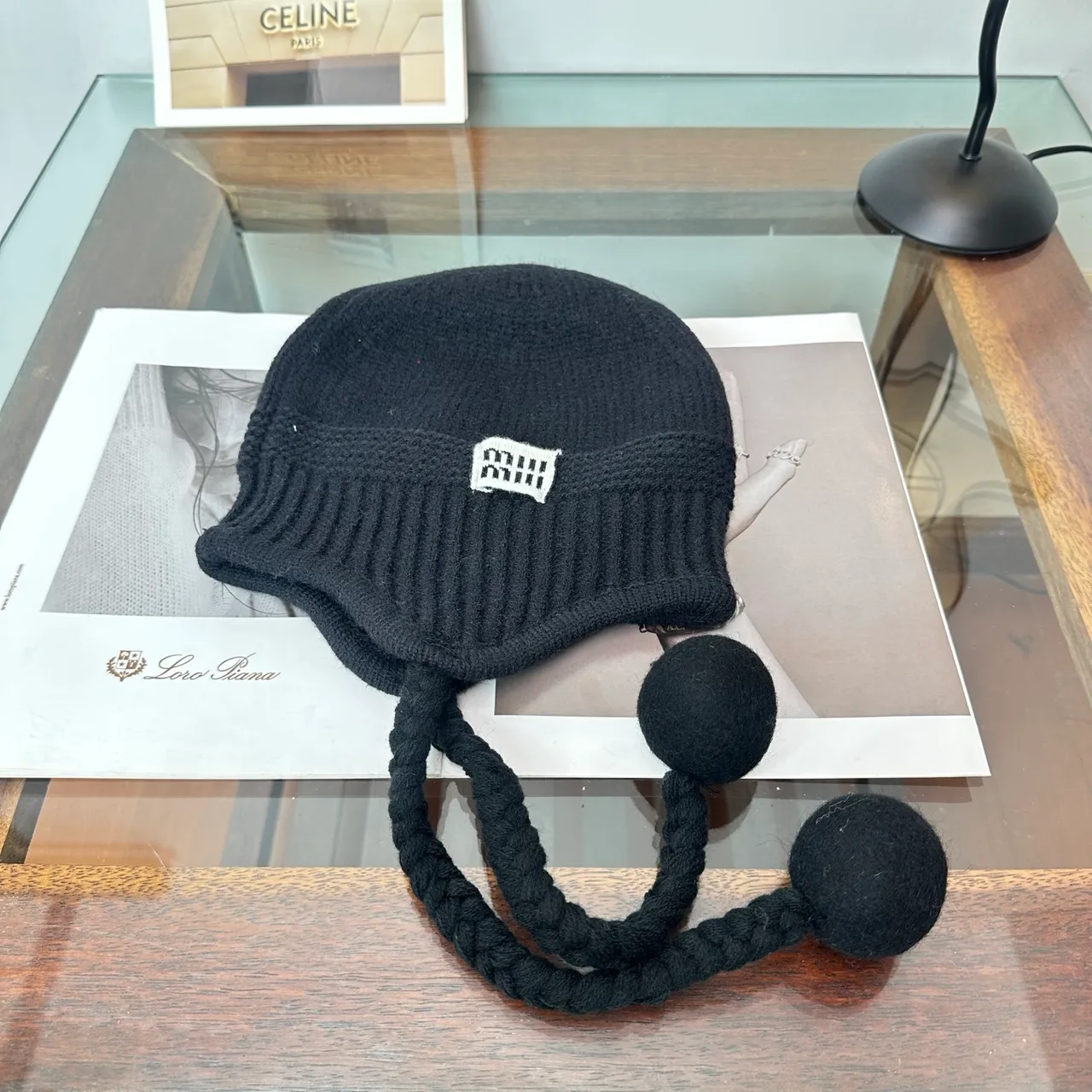 Miu Miu Ribbed Earflap Hat in Black · view 1