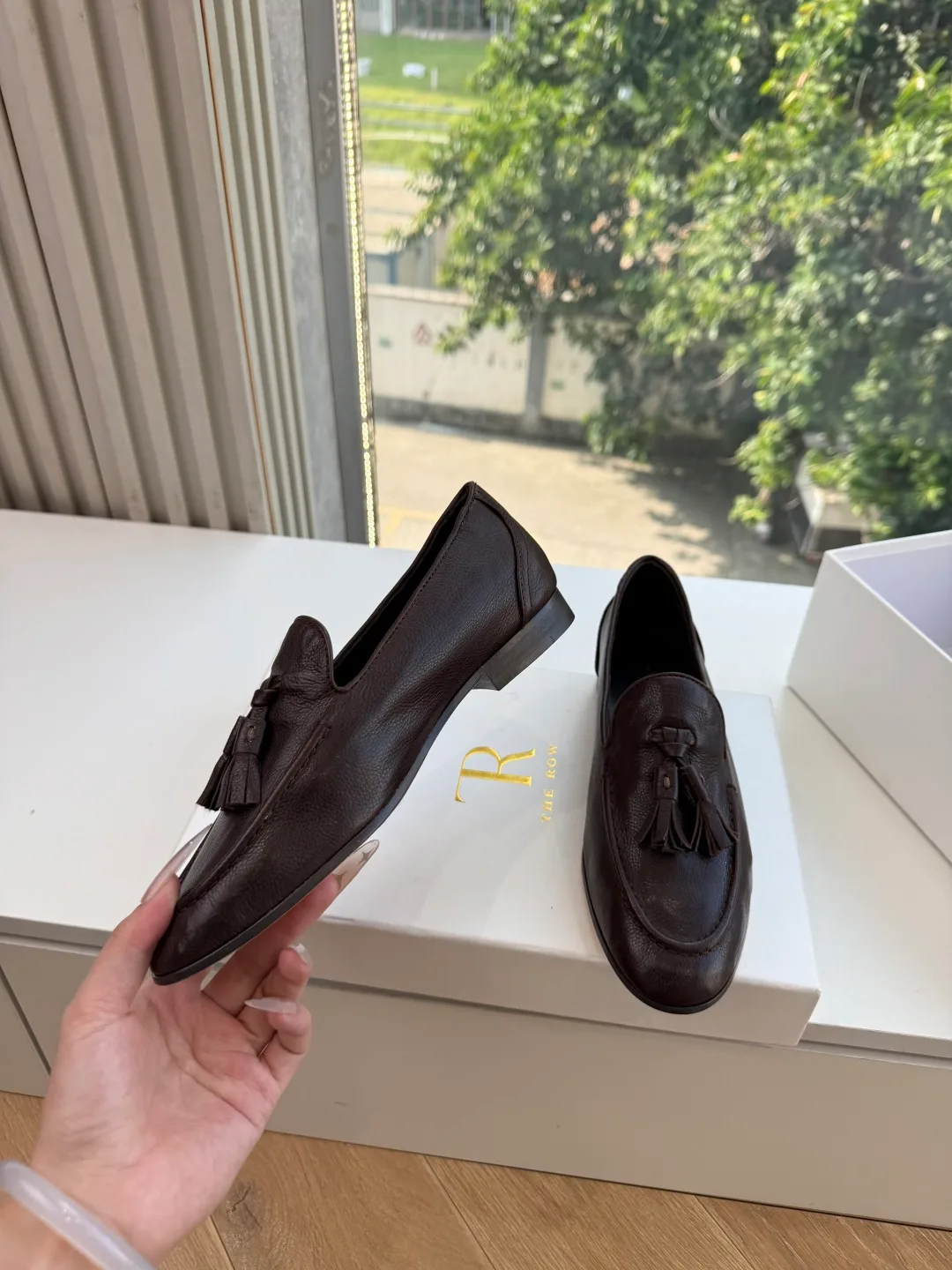 The Row Cowhide Glossy Round-Toe Tassel Loafers in Brown · view 6