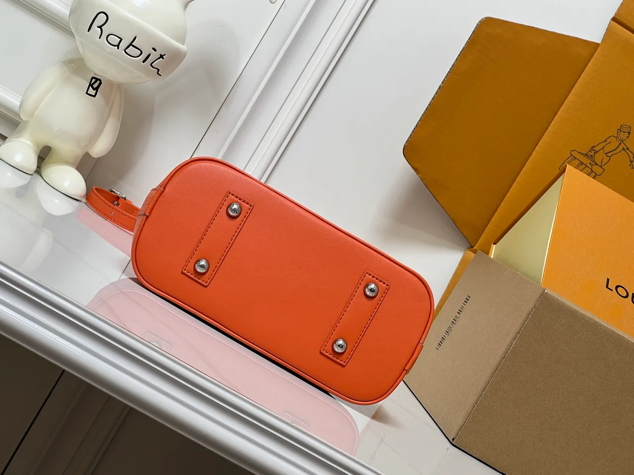 Louis Vuitton Leather Handbag in Orange · view 7