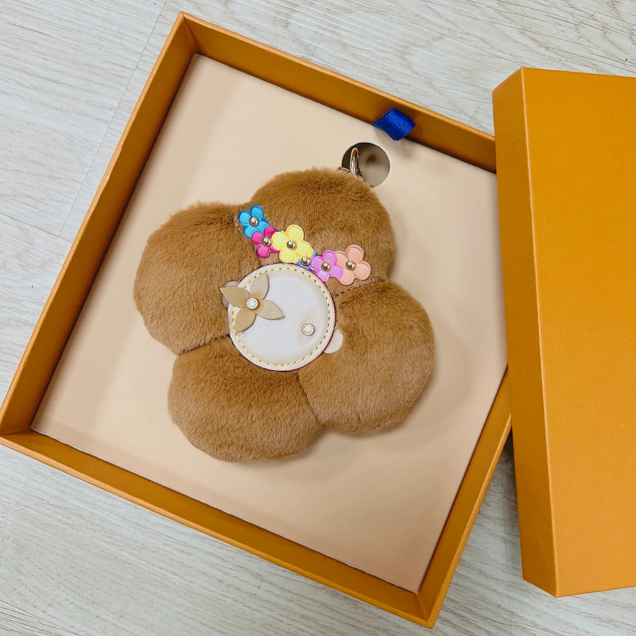 Louis Vuitton Faux-fur flower bag charm in Purple & White & Brown & Yellow & Red & Pink & Black & Blue & Cream · view 3