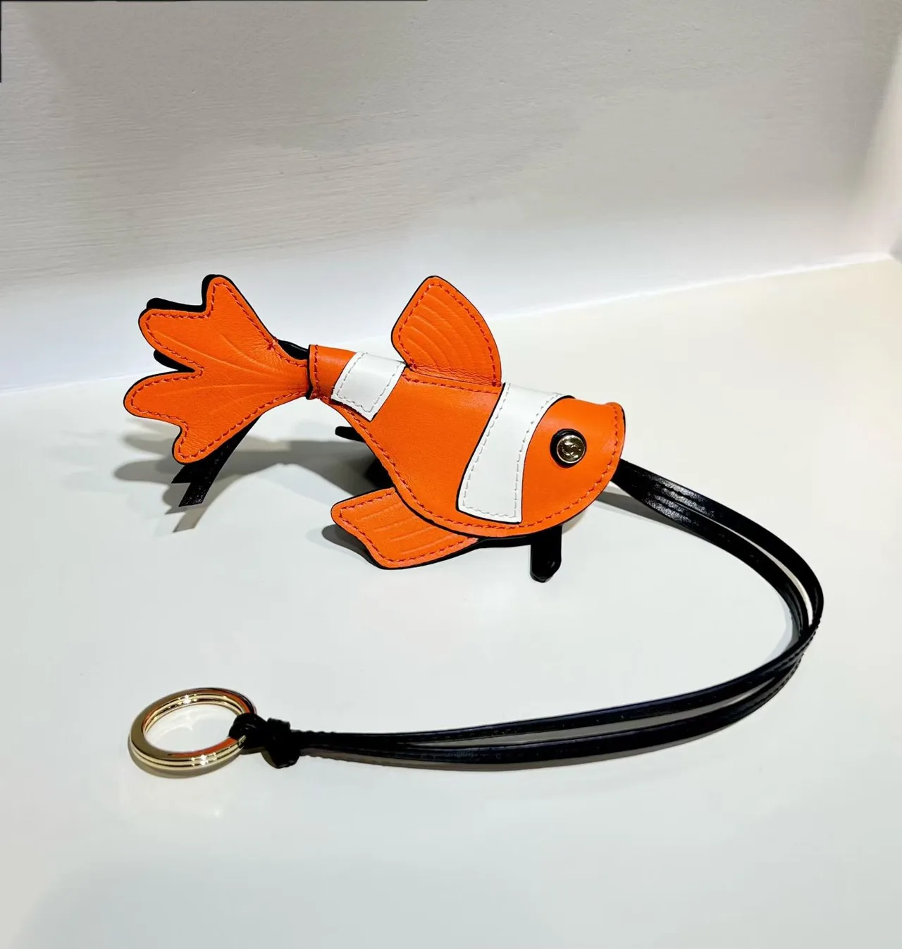 Loewe Fish Bag Charm in Orange & Black · view 1