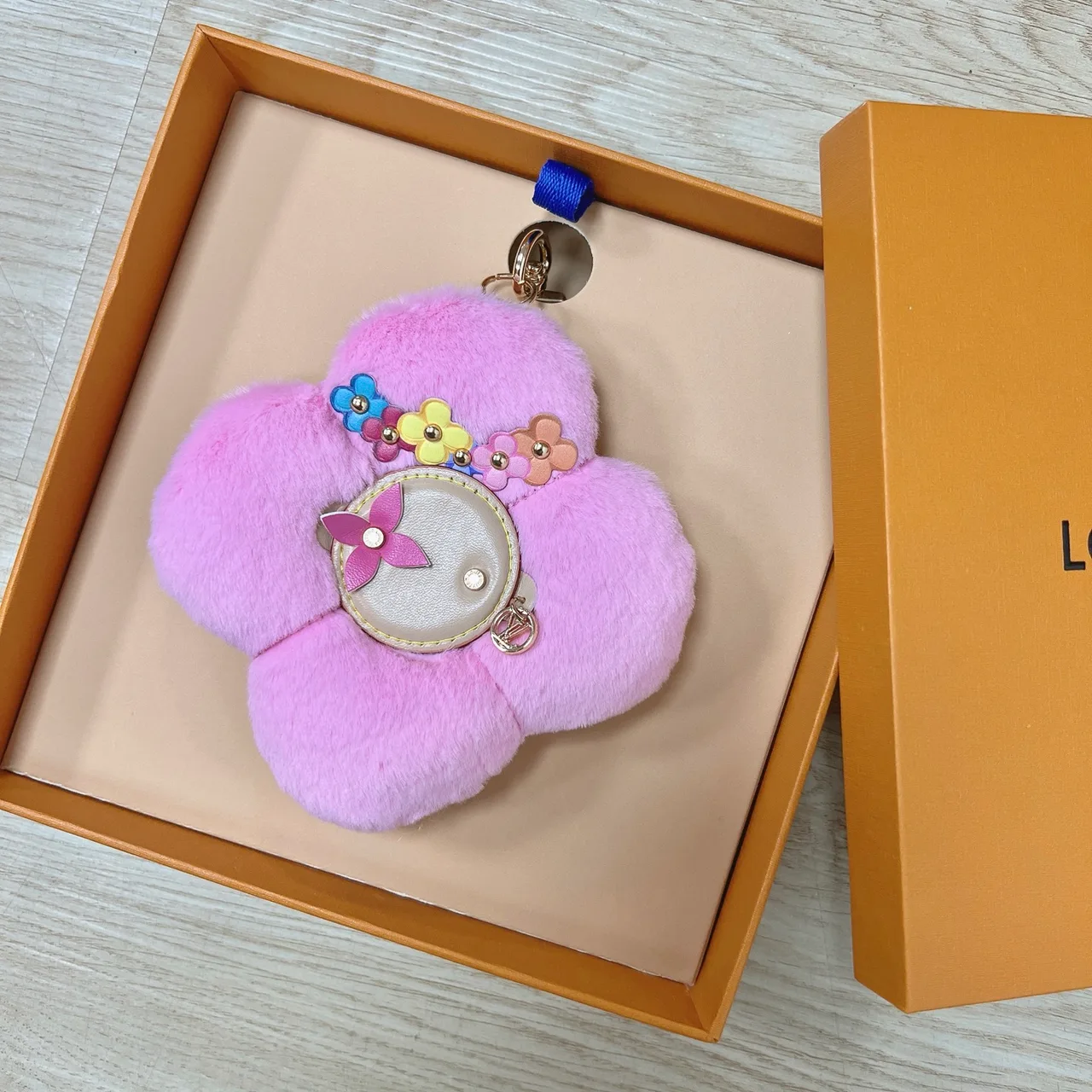 Louis Vuitton Faux-fur flower bag charm in Purple & White & Brown & Yellow & Red & Pink & Black & Blue & Cream · view 6