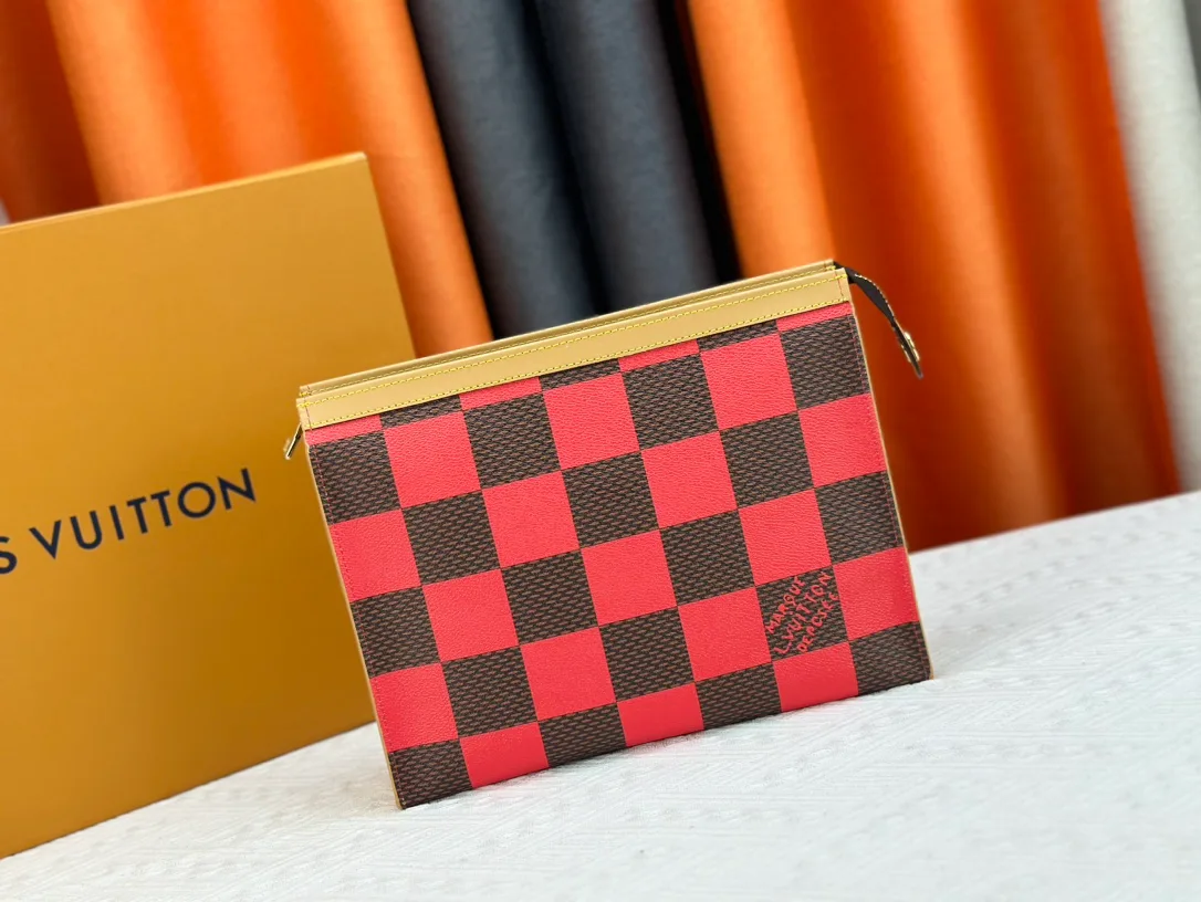 Louis Vuitton Canvas Clutch in Red · view 1