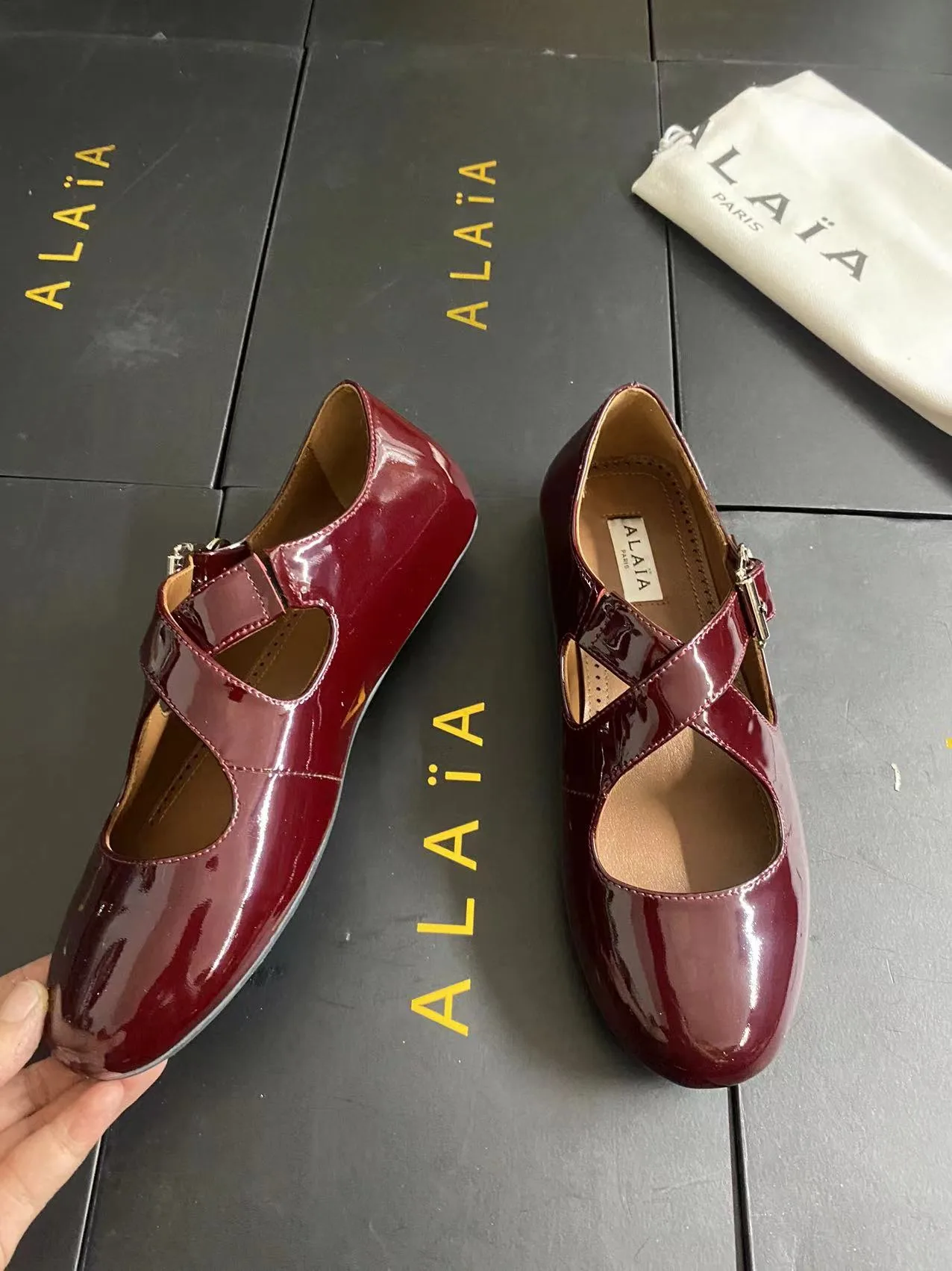 Alaia Cowhide Sheepskin Glossy Square-Toe Buckle Cross-Strap Mary Jane Flats in Burgundy · view 4