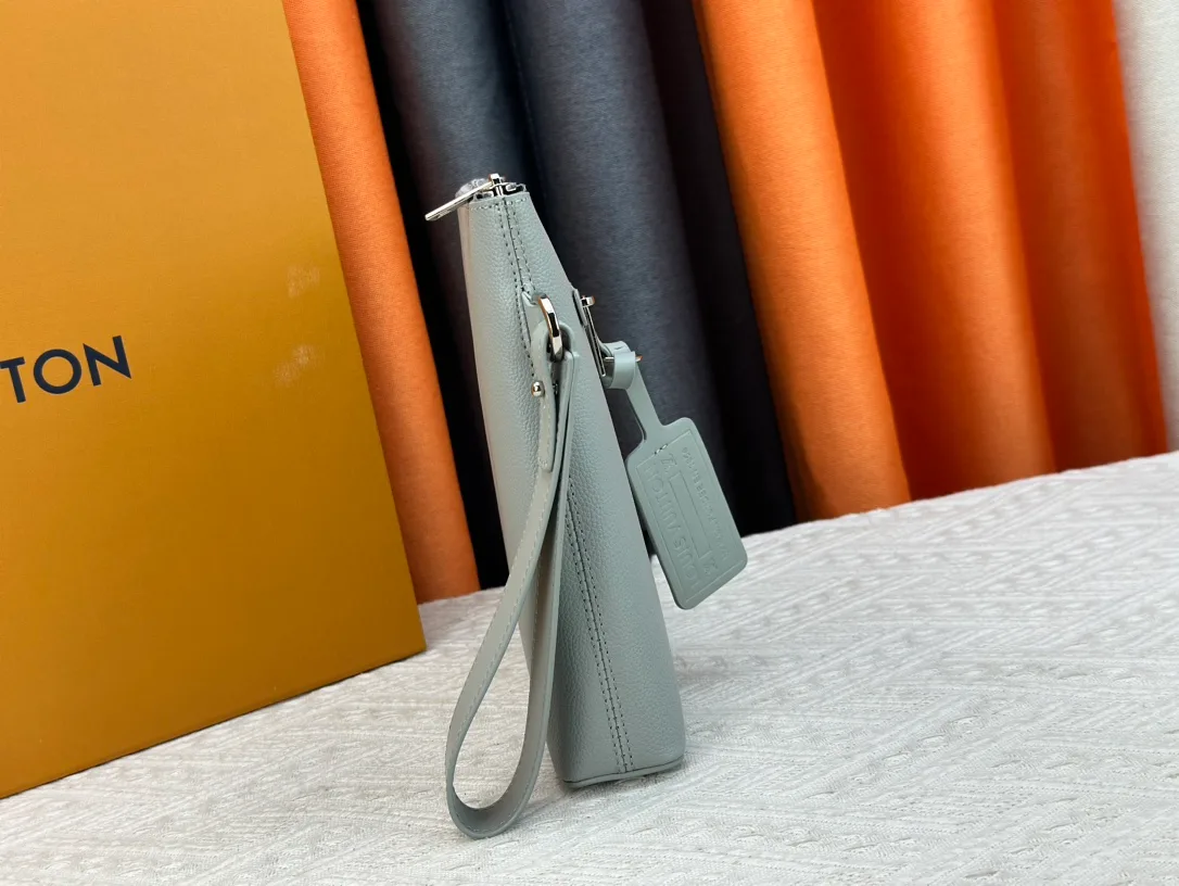 Louis Vuitton Cowhide Clutch in Grey · view 3