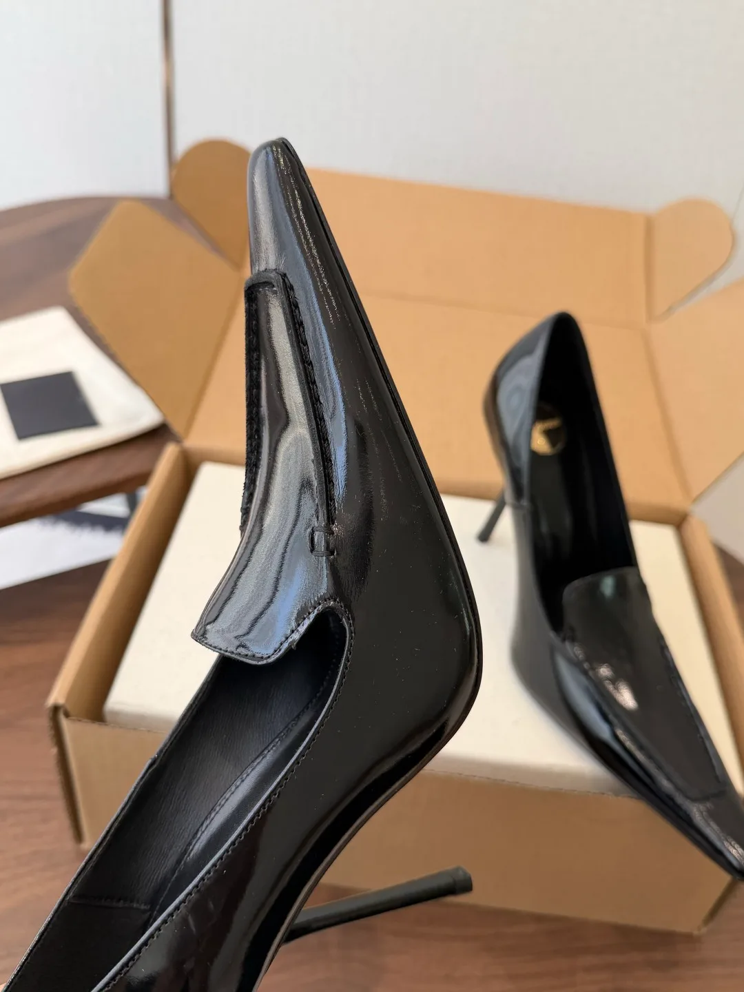 Saint Laurent Cowhide Glossy Pointed-Toe Pumps in Black · view 6
