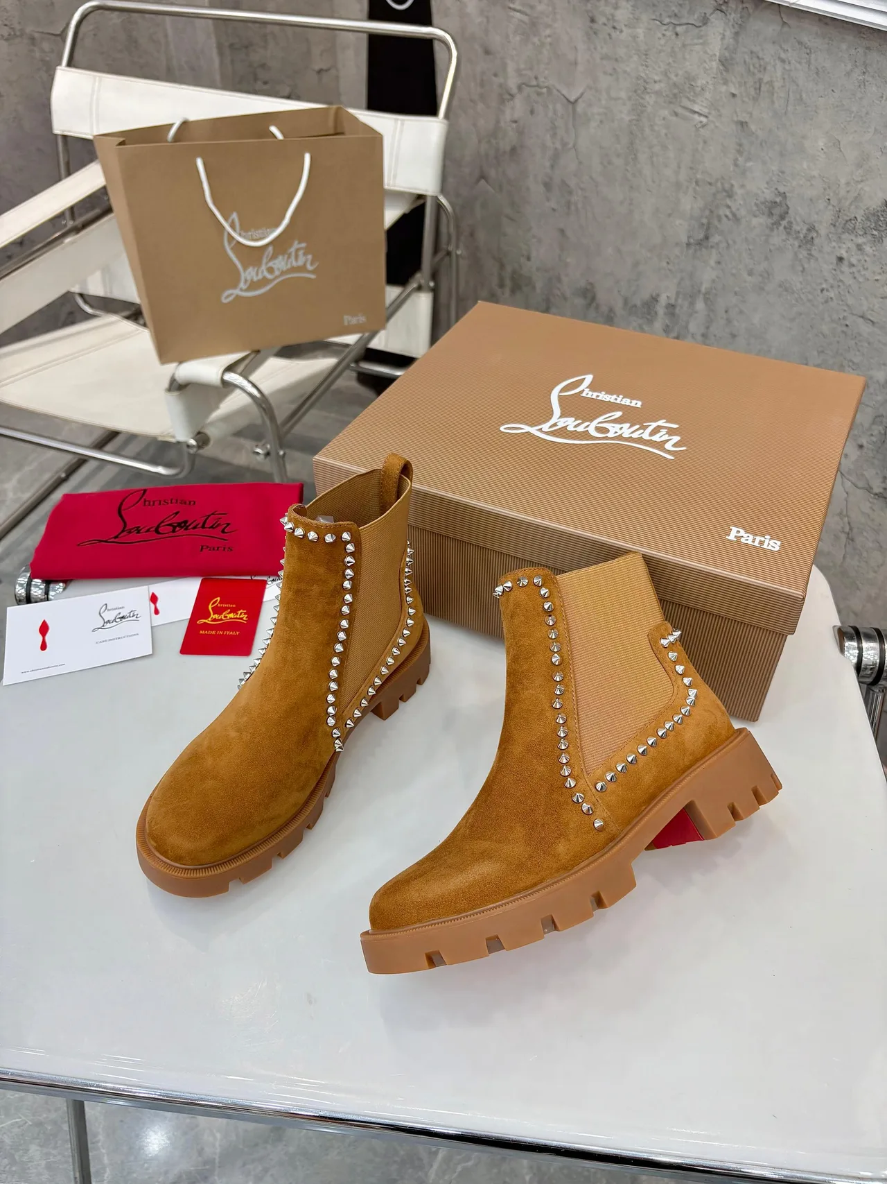 Christian Louboutin Stud-trim ankle boots in Black & Tan · view 6
