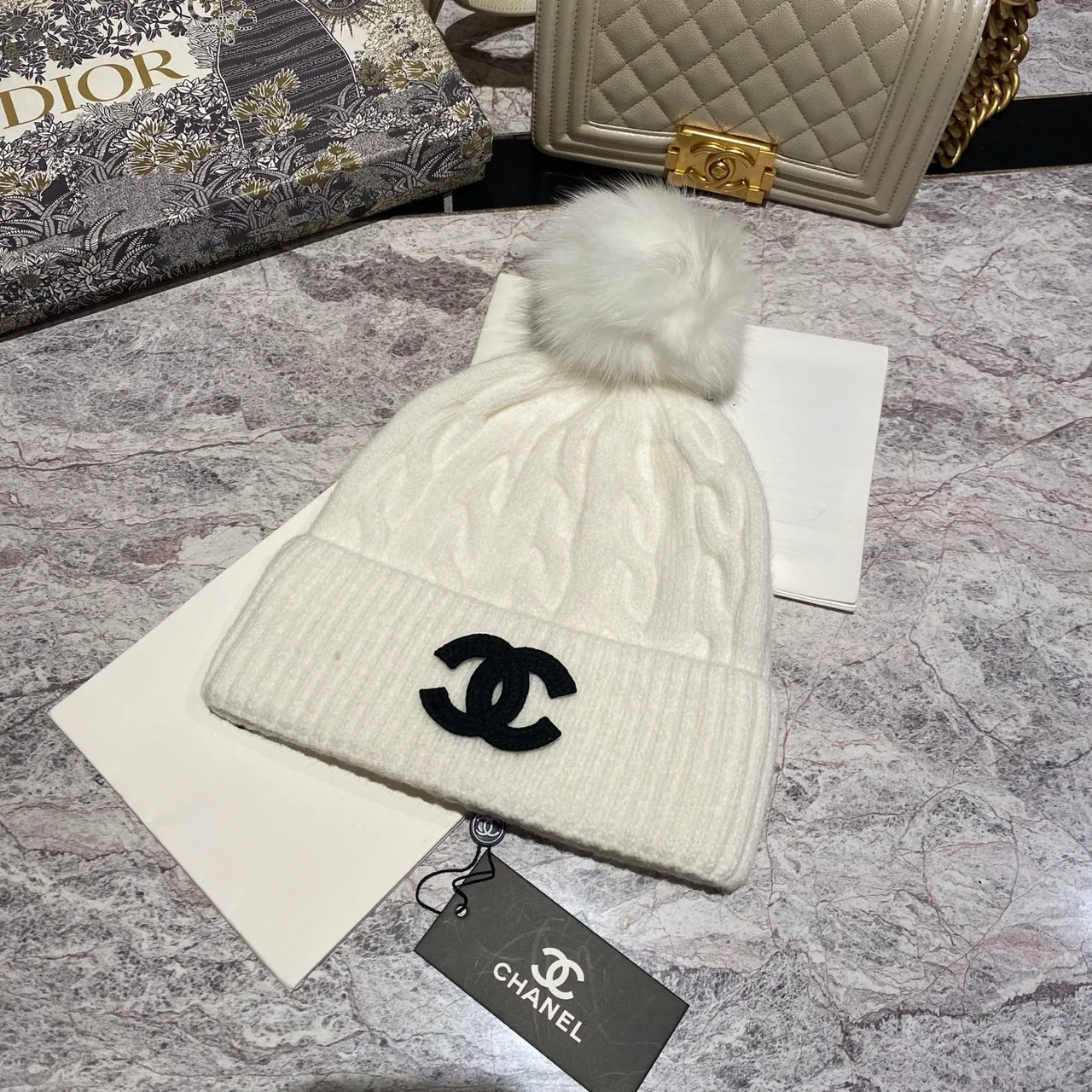 Chanel CC pom knit beanie in Blue & Burgundy & Black & White & Grey & Cream & Pink & Tan · view 4