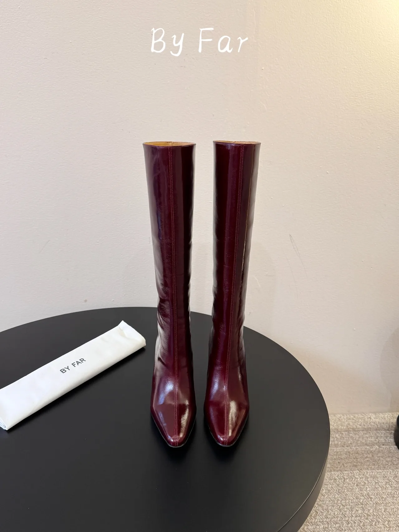 By Far Glossy Pointed-Toe Knee-High Boots in Burgundy · view 1