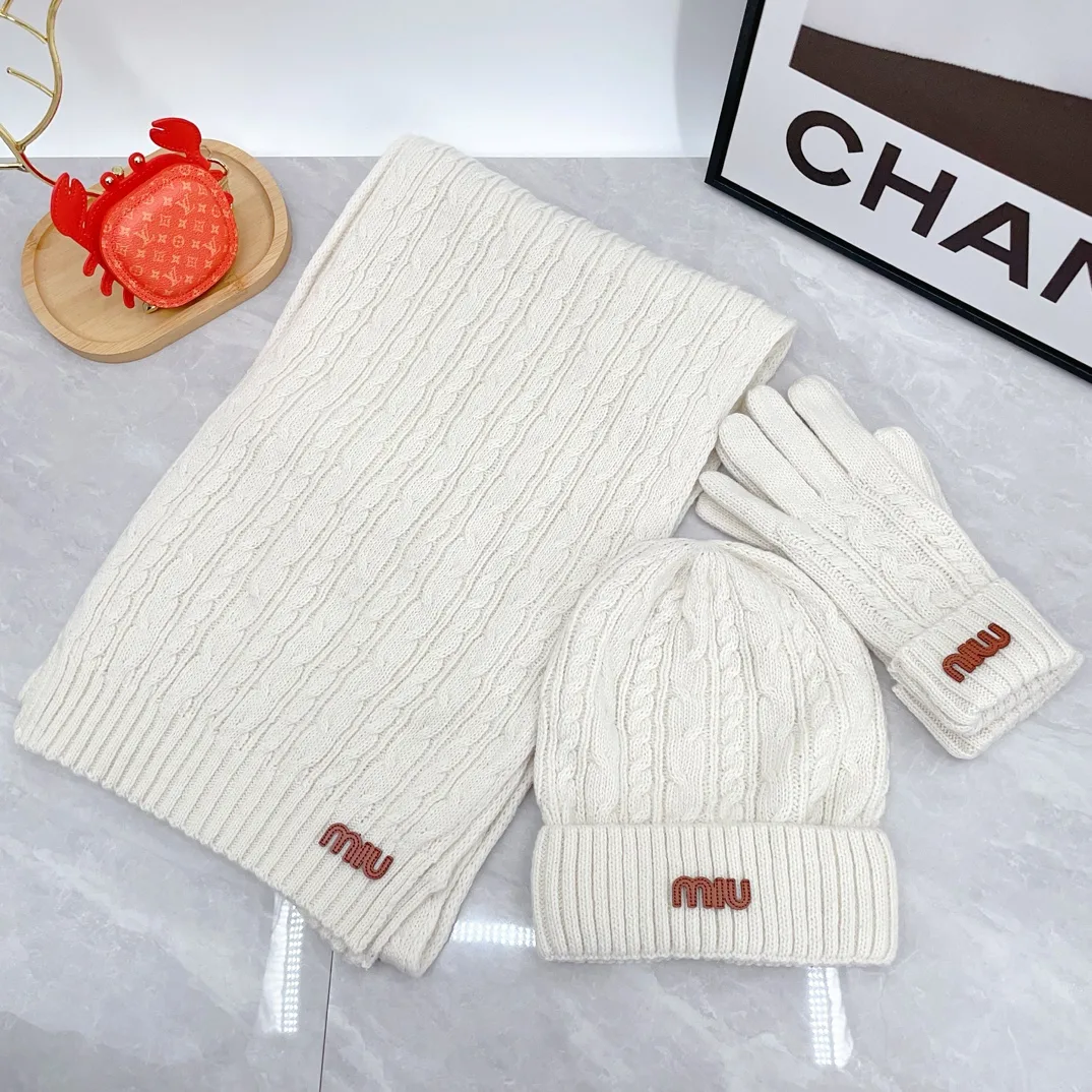 Miu Miu Wool Ribbed Hat Scarf and Gloves Set in White · view 1