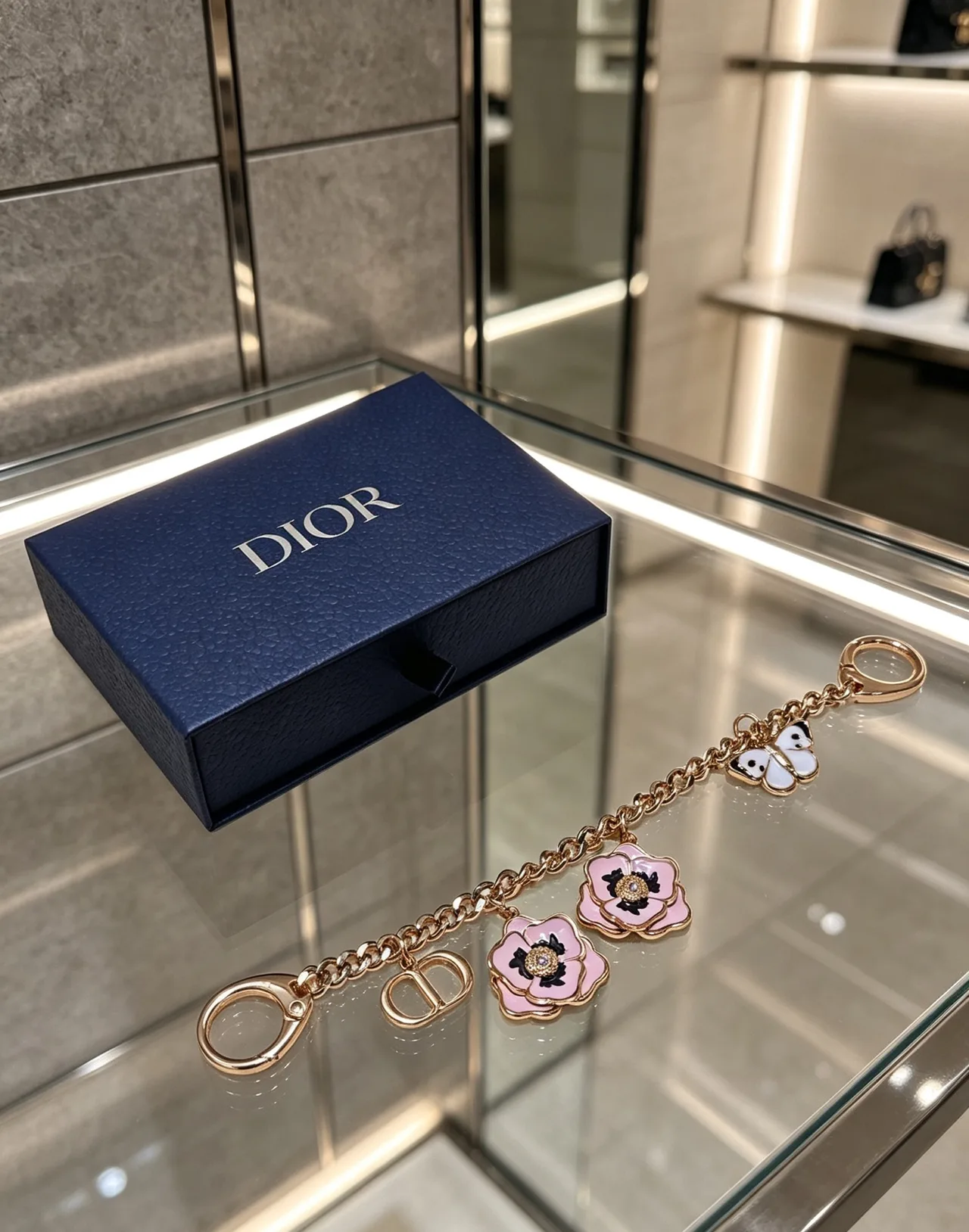 Dior Floral Butterfly Bag Charm in Gold · view 2