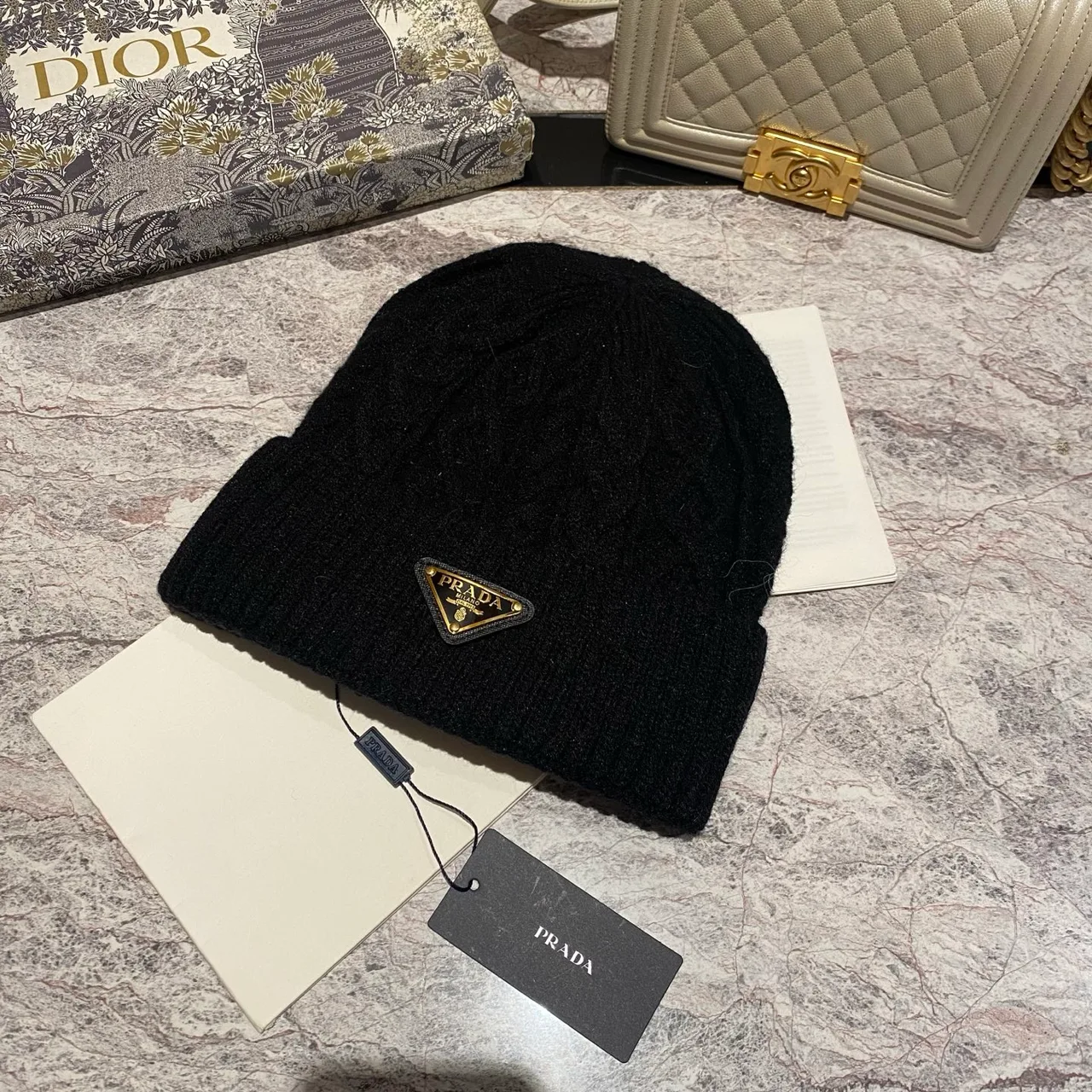 Prada Cable-Knit Beanie in Grey / Black / White / Tan / Cream · view 2