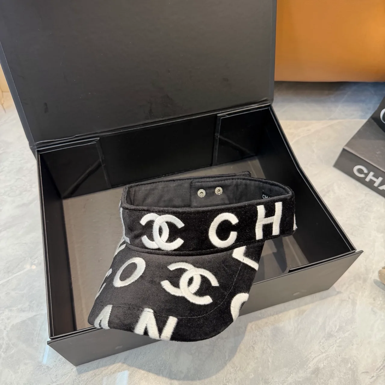 Chanel Glossy CC Sun Visor in Black · view 8