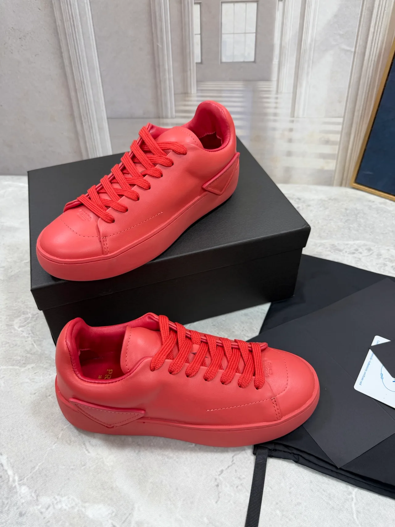 Prada Cowhide Round-Toe Low-Top Sneakers in Red · view 2