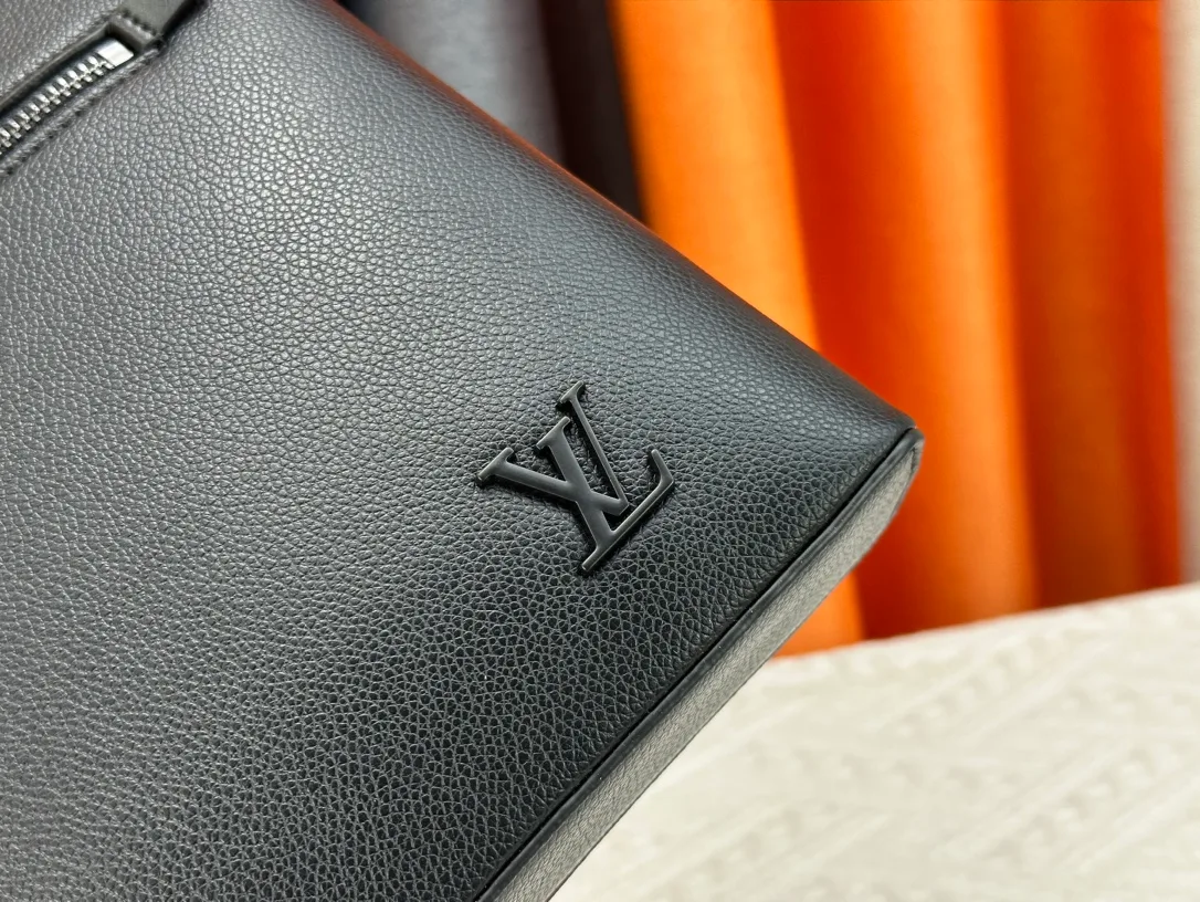 Louis Vuitton Cowhide Clutch in Black · view 7