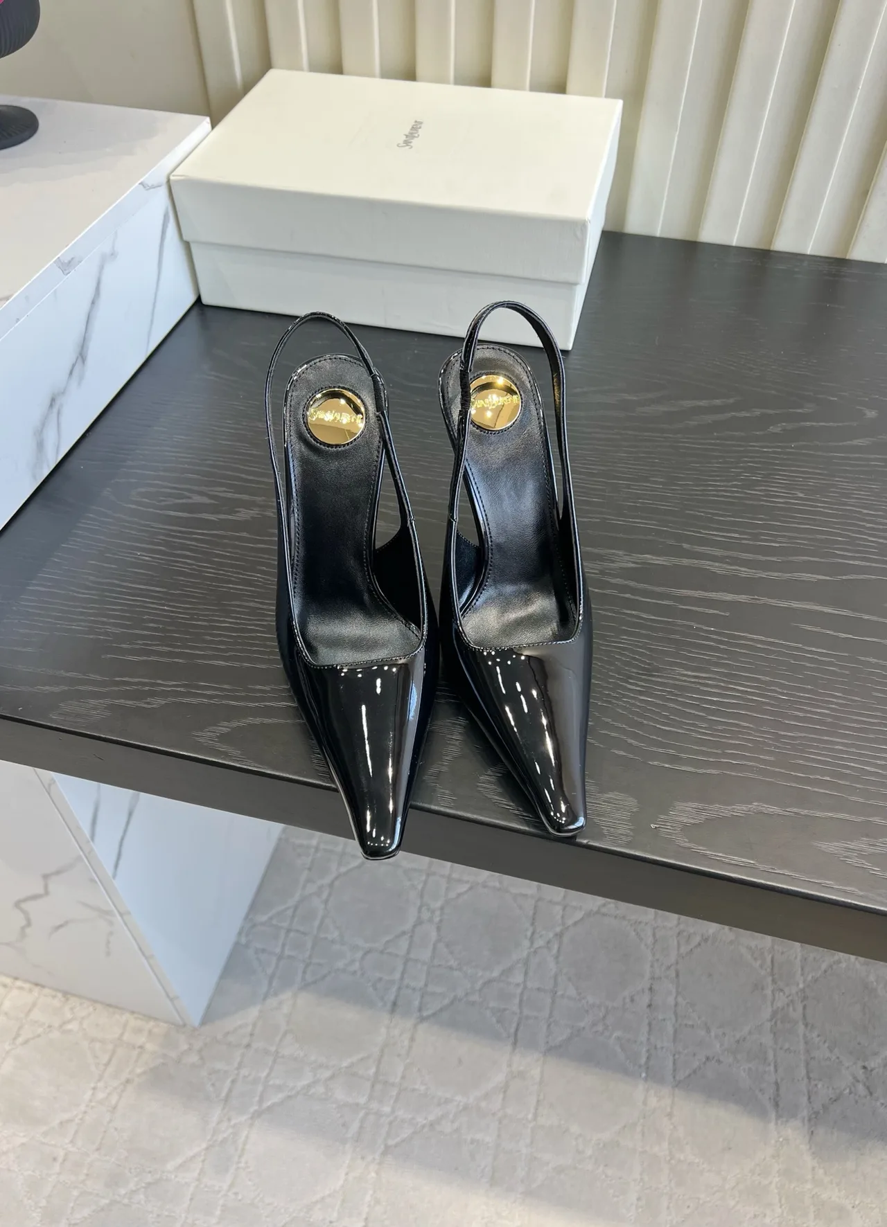 Saint Laurent Cowhide Silk Glossy Pointed-Toe Buckle Slingback Heels in Black · view 1