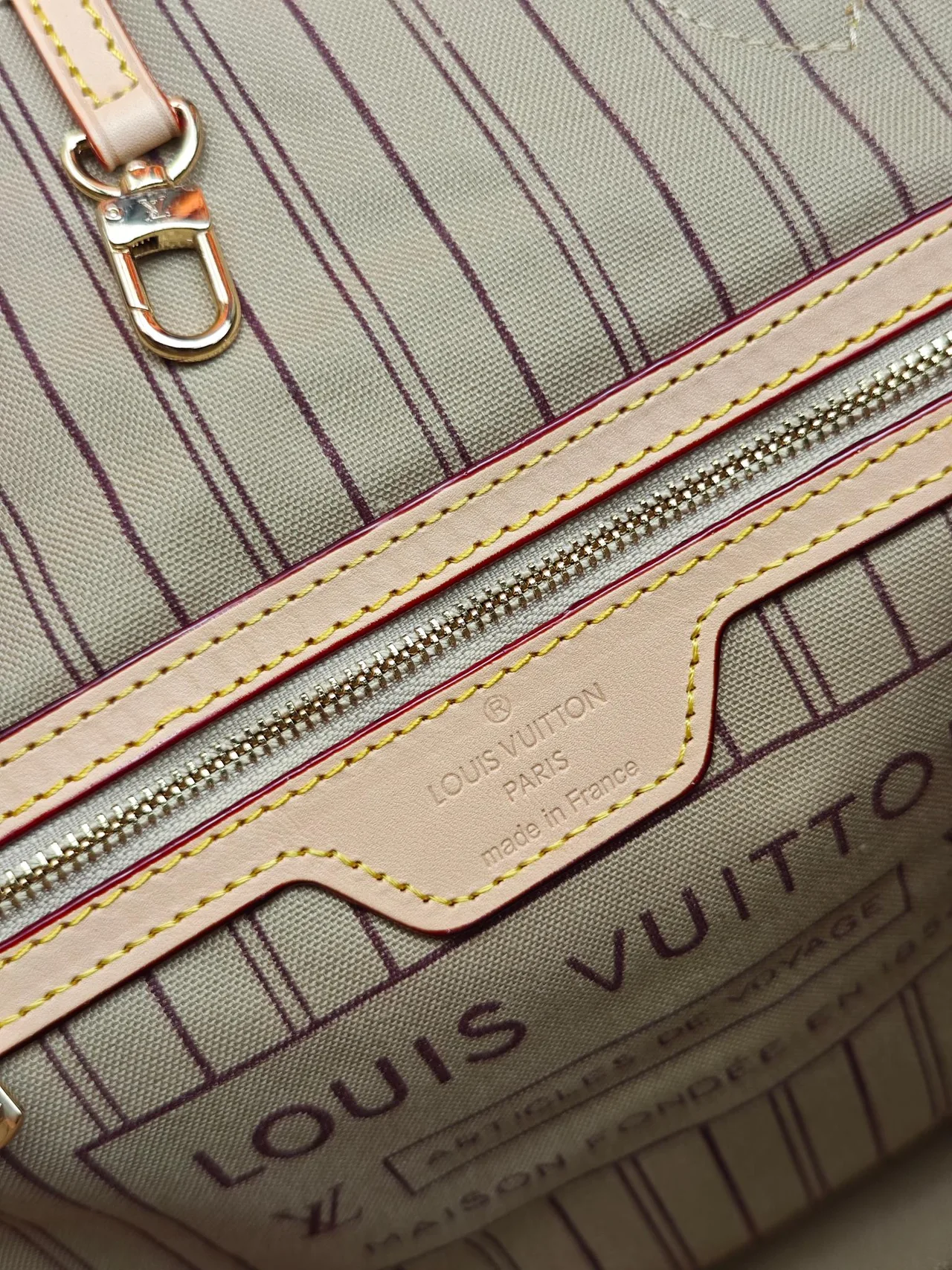 Louis Vuitton Neverfull Clutch in Brown · view 8