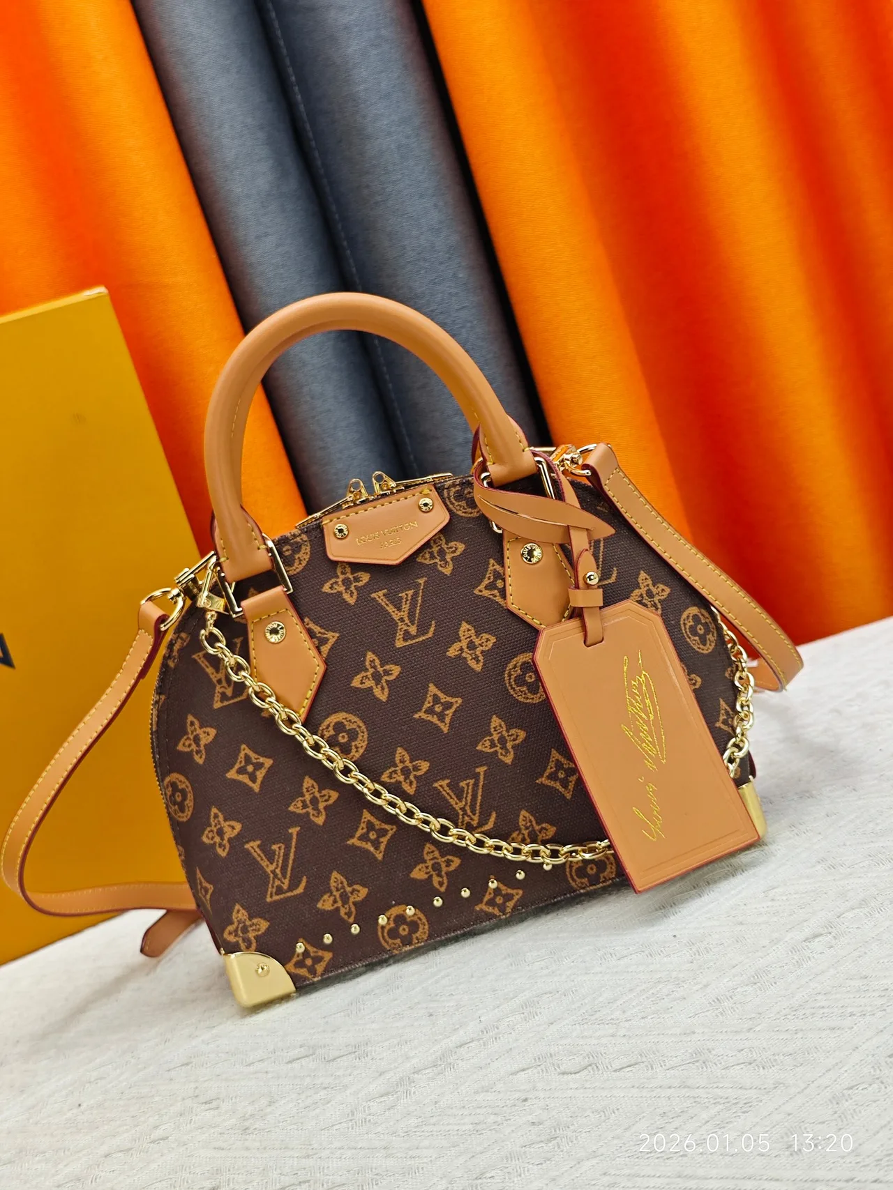 Louis Vuitton Top-Handle Bag in Brown · view 1
