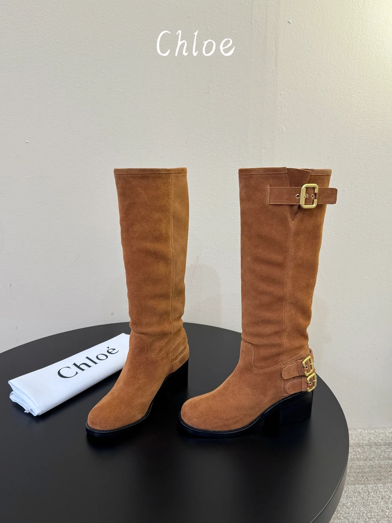 Chloe Cowhide Suede-Look Round-Toe Buckle Knee-High Boots in Brown · view 1