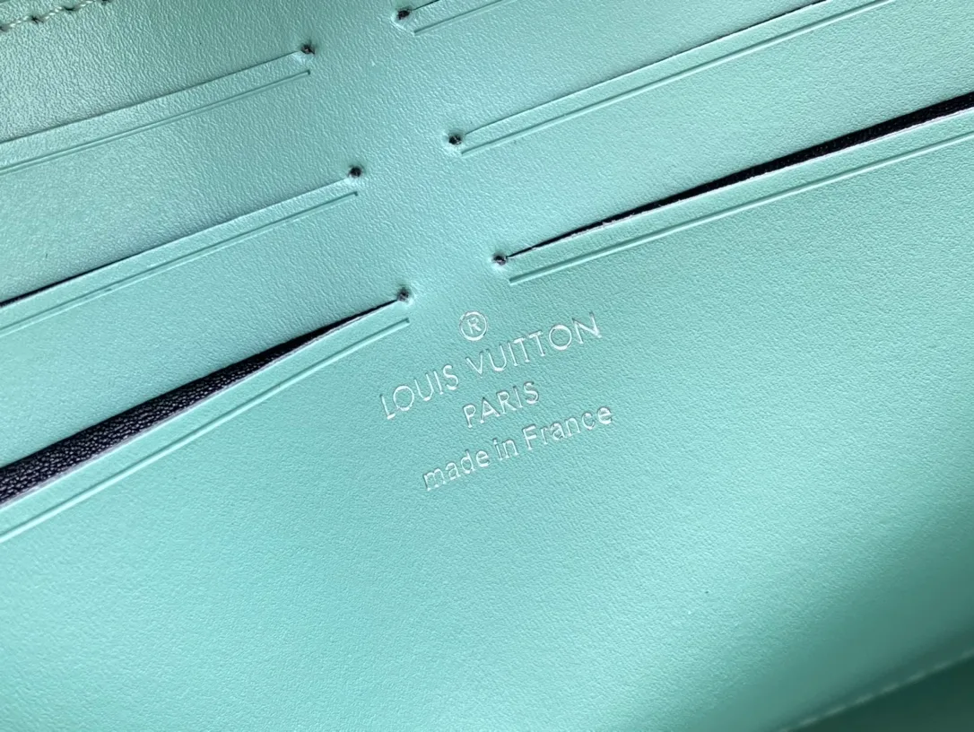Louis Vuitton Cowhide Canvas Clutch in Green · view 8