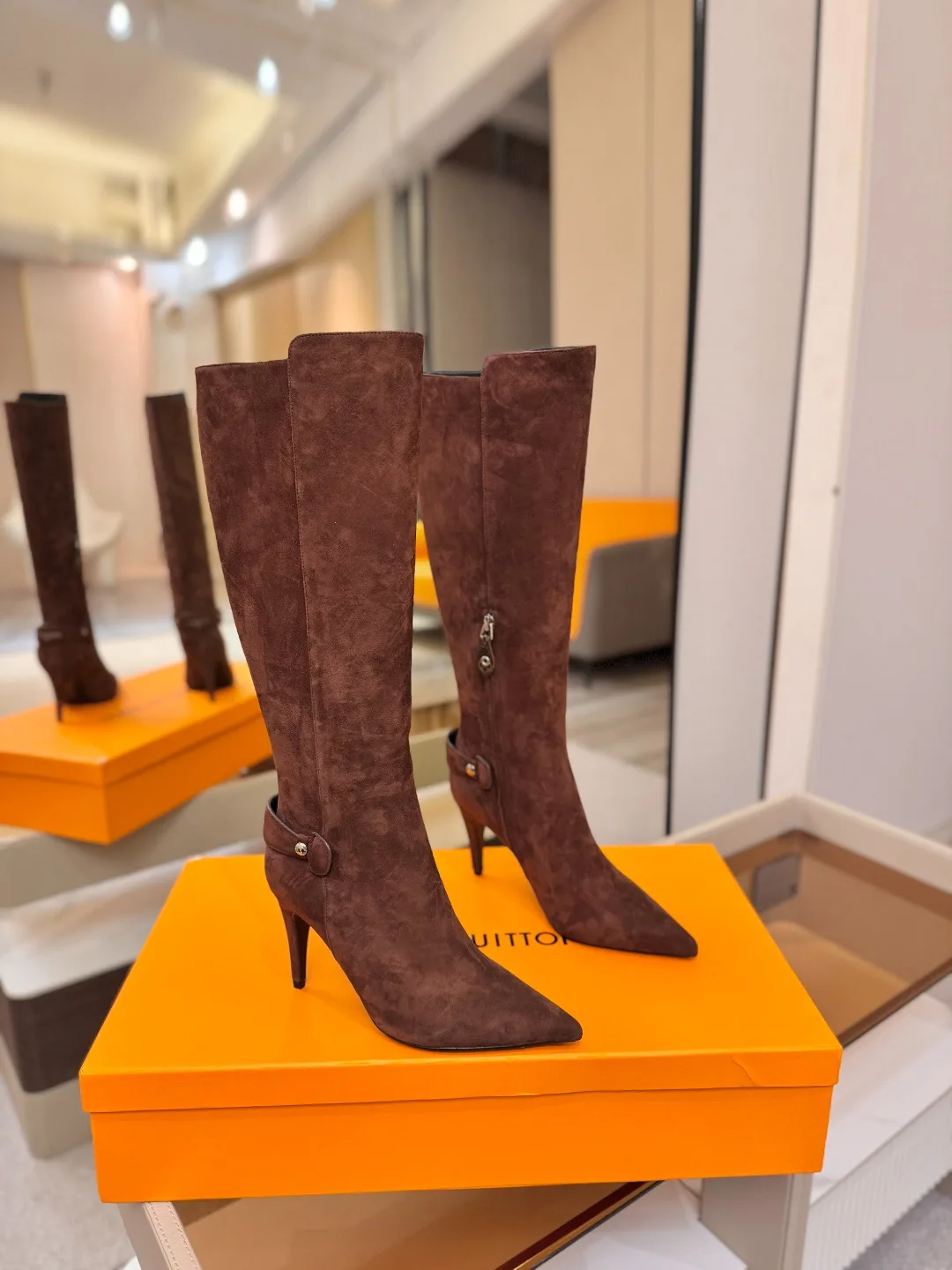 Louis Vuitton Calfskin Buckle Knee-High Boots in Brown · view 1