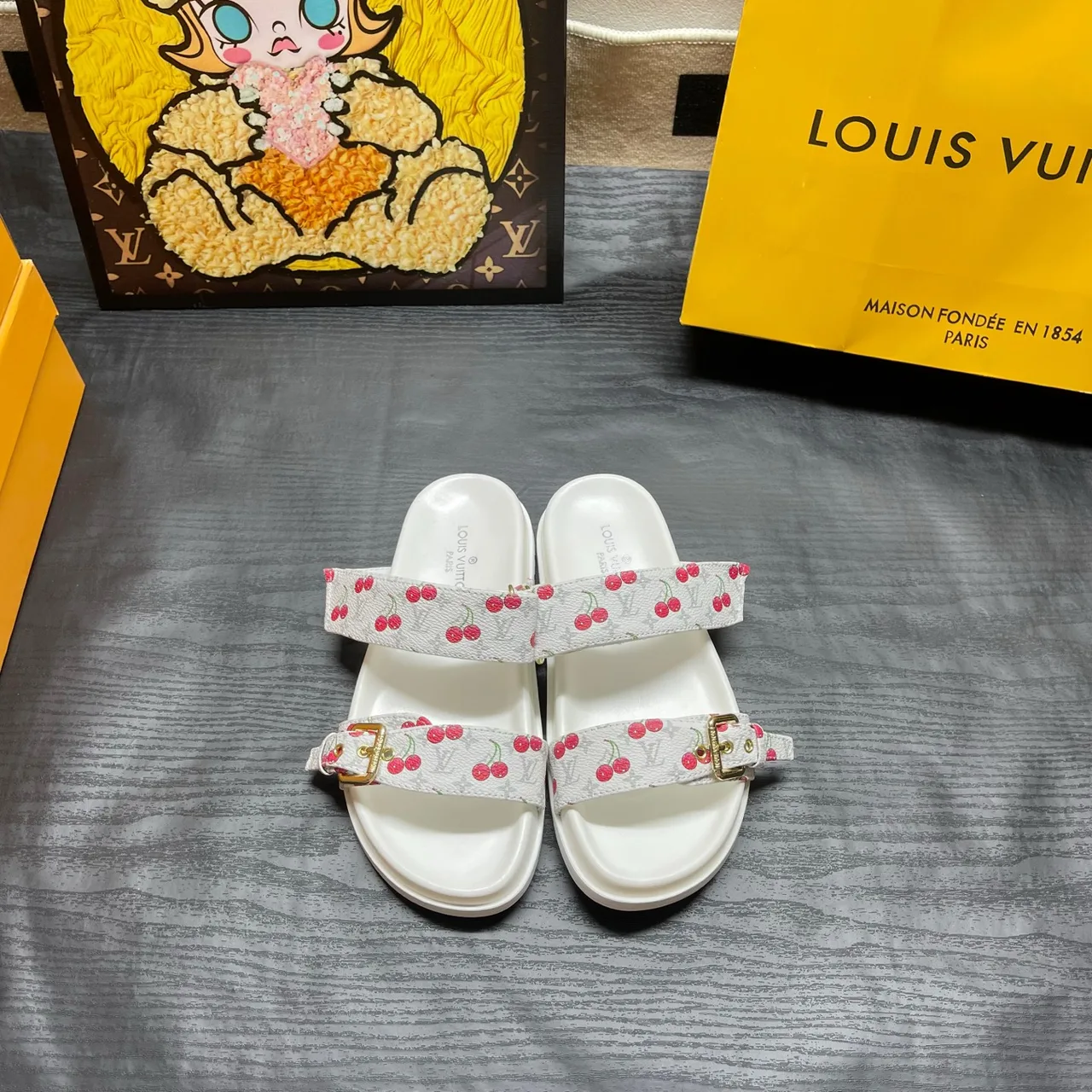 Louis Vuitton Two-Strap Buckle Slides in Black / White / Brown / Blue · view 3