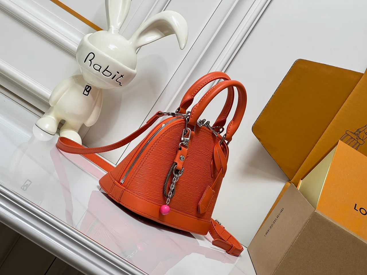 Louis Vuitton Leather Handbag in Orange · view 2