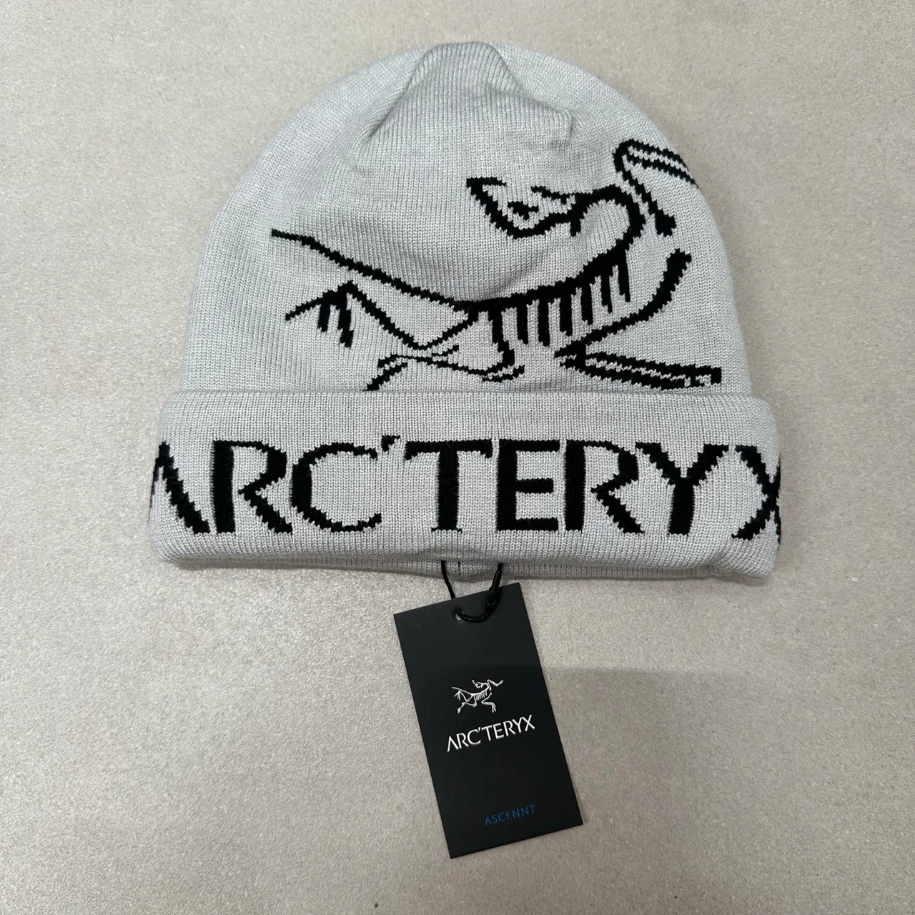Arc'teryx Graphic knit beanie in Cream & Grey & Burgundy & Orange & Green & Pink & Yellow & Black & Blue & Beige & Tan · view 4