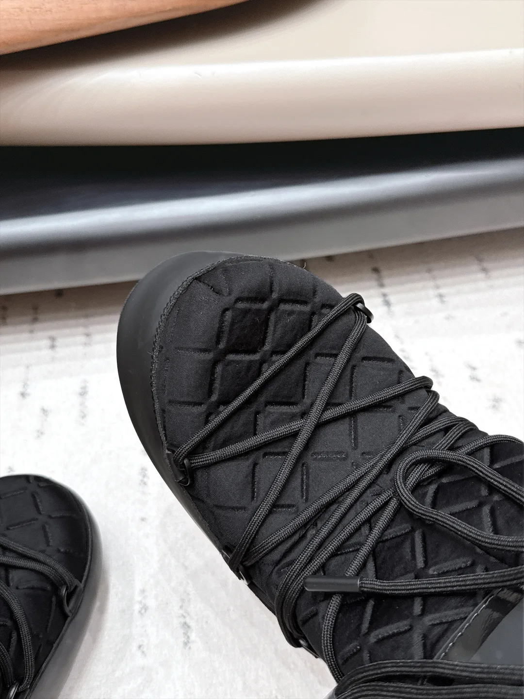 Moon Boot Glossy Quilted Snow Boots in Black · view 6