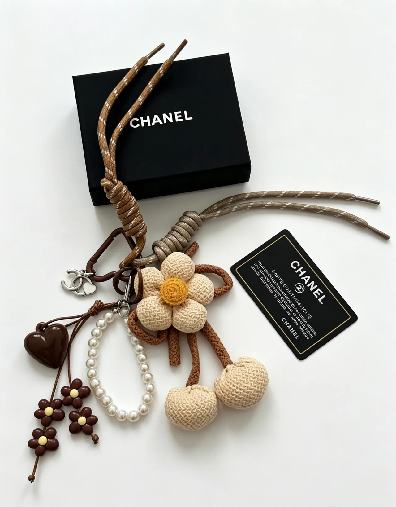 Chanel Woven Flower Bag Charm in Beige · view 2