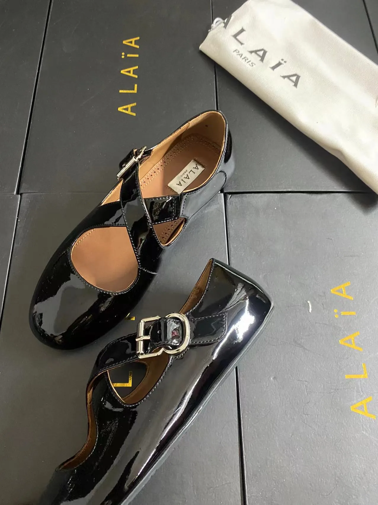 Alaia Cowhide Sheepskin Glossy Square-Toe Mary Jane Flats in Black · view 4