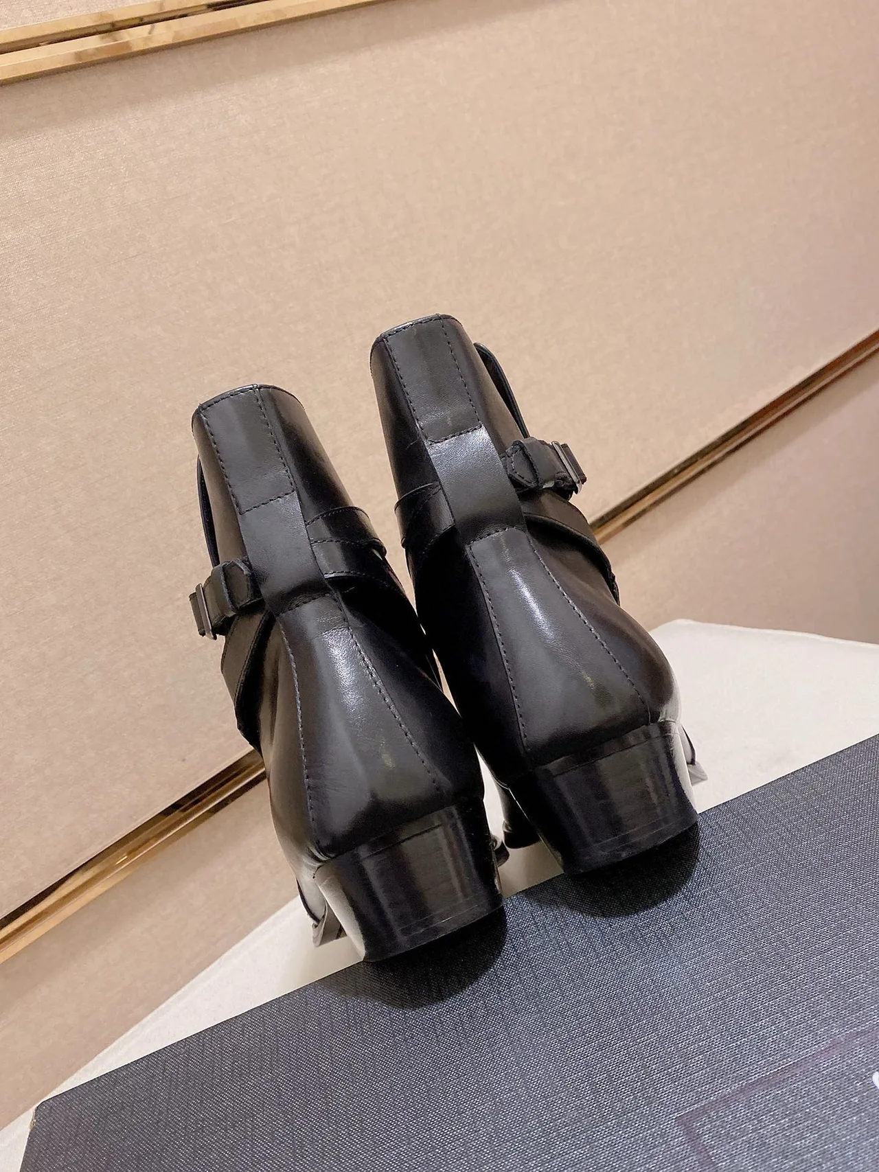 Saint Laurent Cowhide Glossy Pointed-Toe Buckle Ankle Boots in Black · view 6