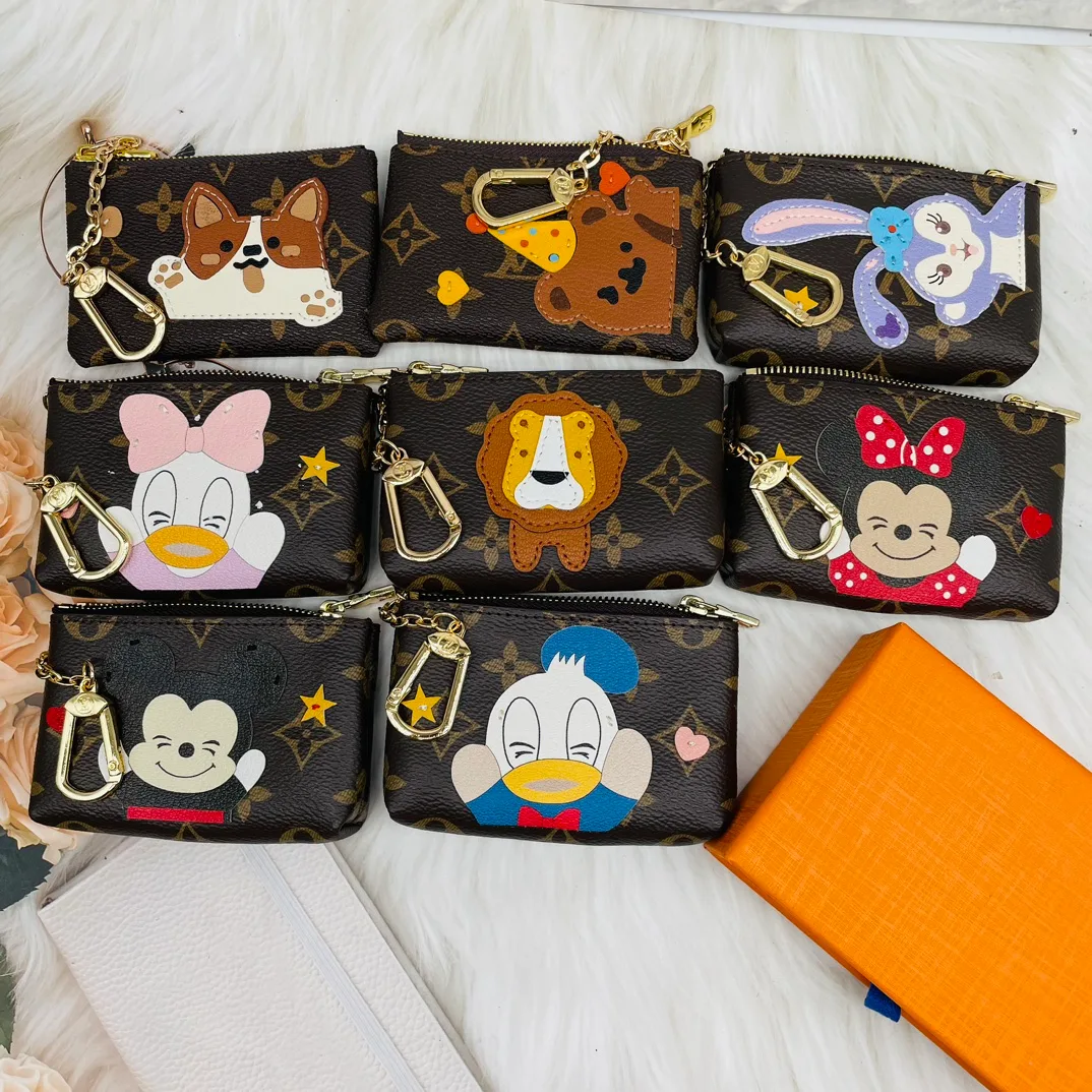 Louis Vuitton Cartoon Zip Pouch Keychain in Brown · view 1
