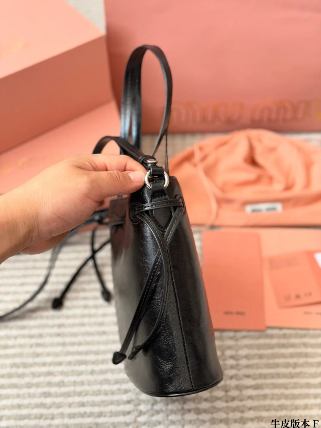 Miu Miu Cowhide Bucket Bag in Black · view 7