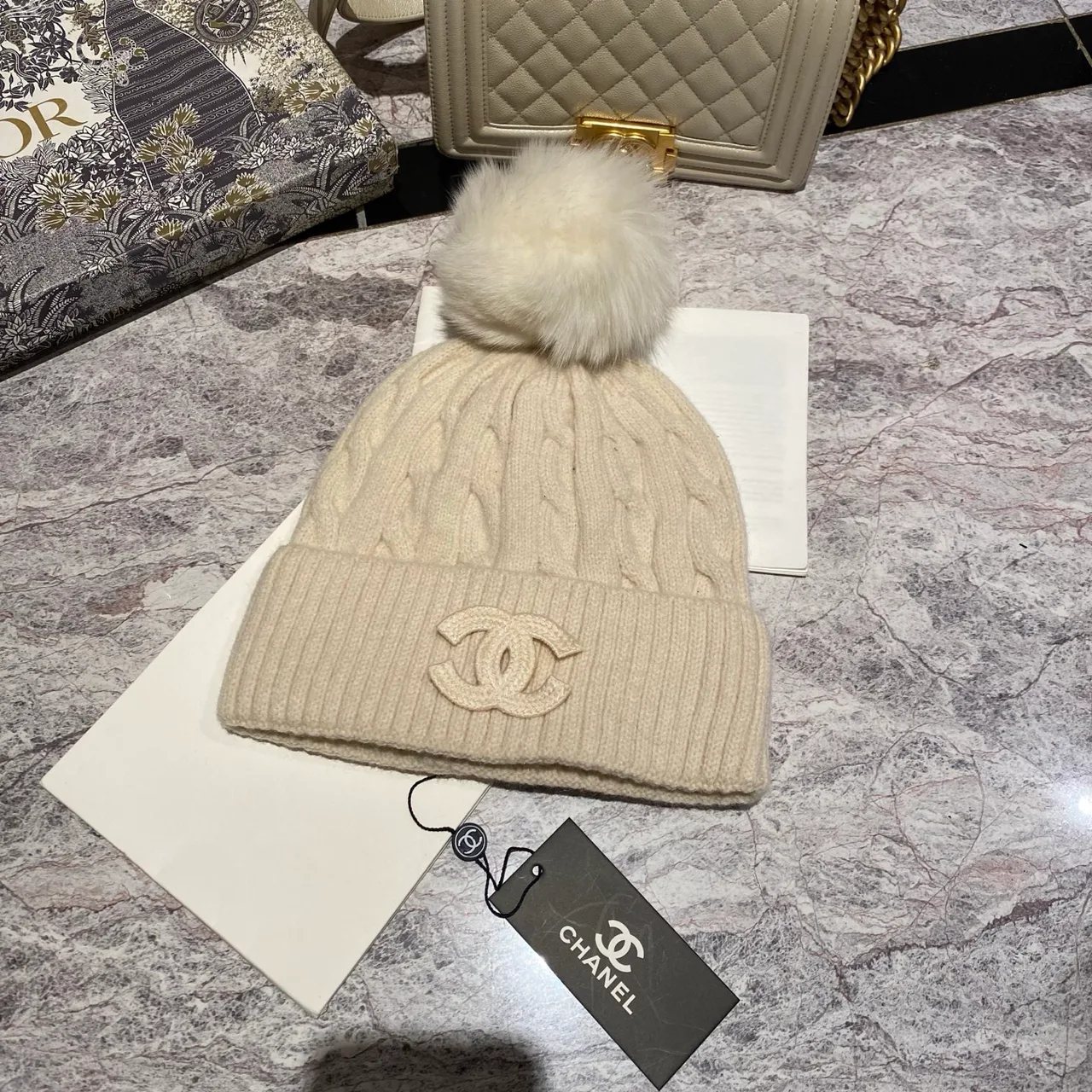Chanel CC pom knit beanie in Blue & Burgundy & Black & White & Grey & Cream & Pink & Tan · view 6