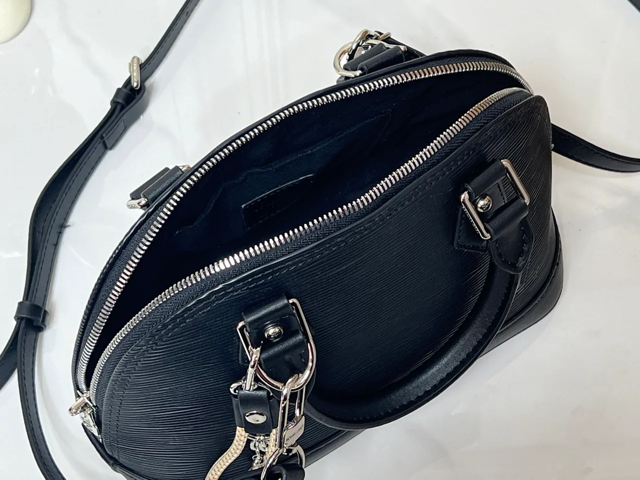 Louis Vuitton Leather Handbag in Black · view 8