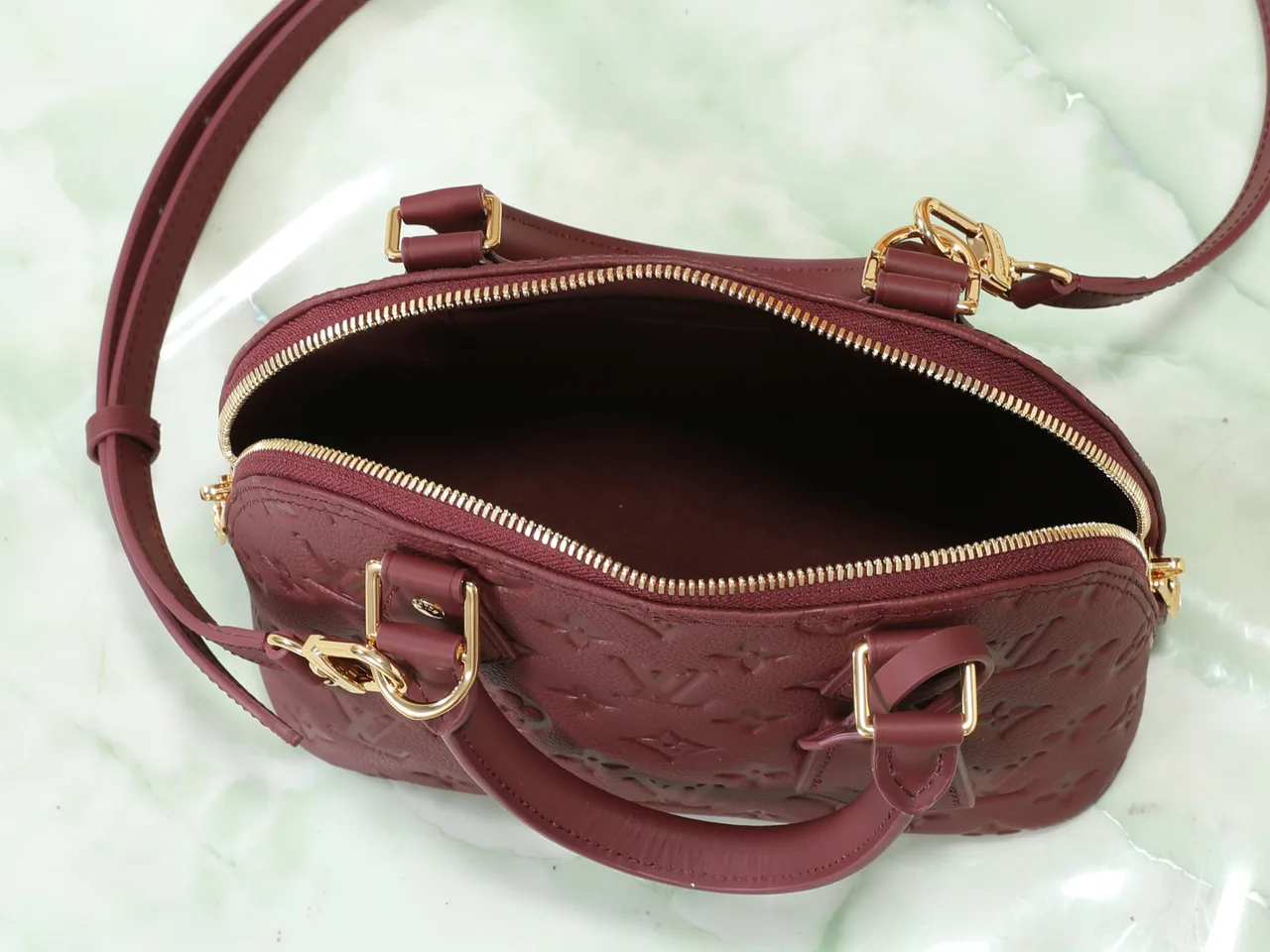 Louis Vuitton Leather Quilted Top-Handle Bag in Burgundy · view 8