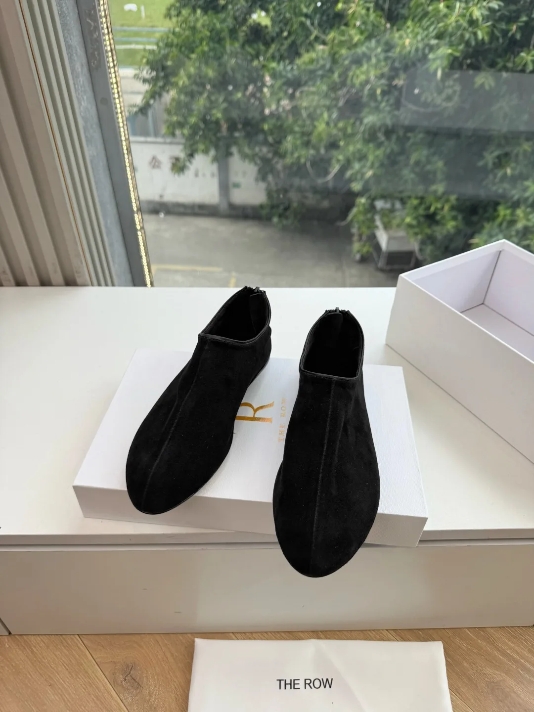 The Row Ribbed Matte Round-Toe Slip-On Flats in Black · view 1