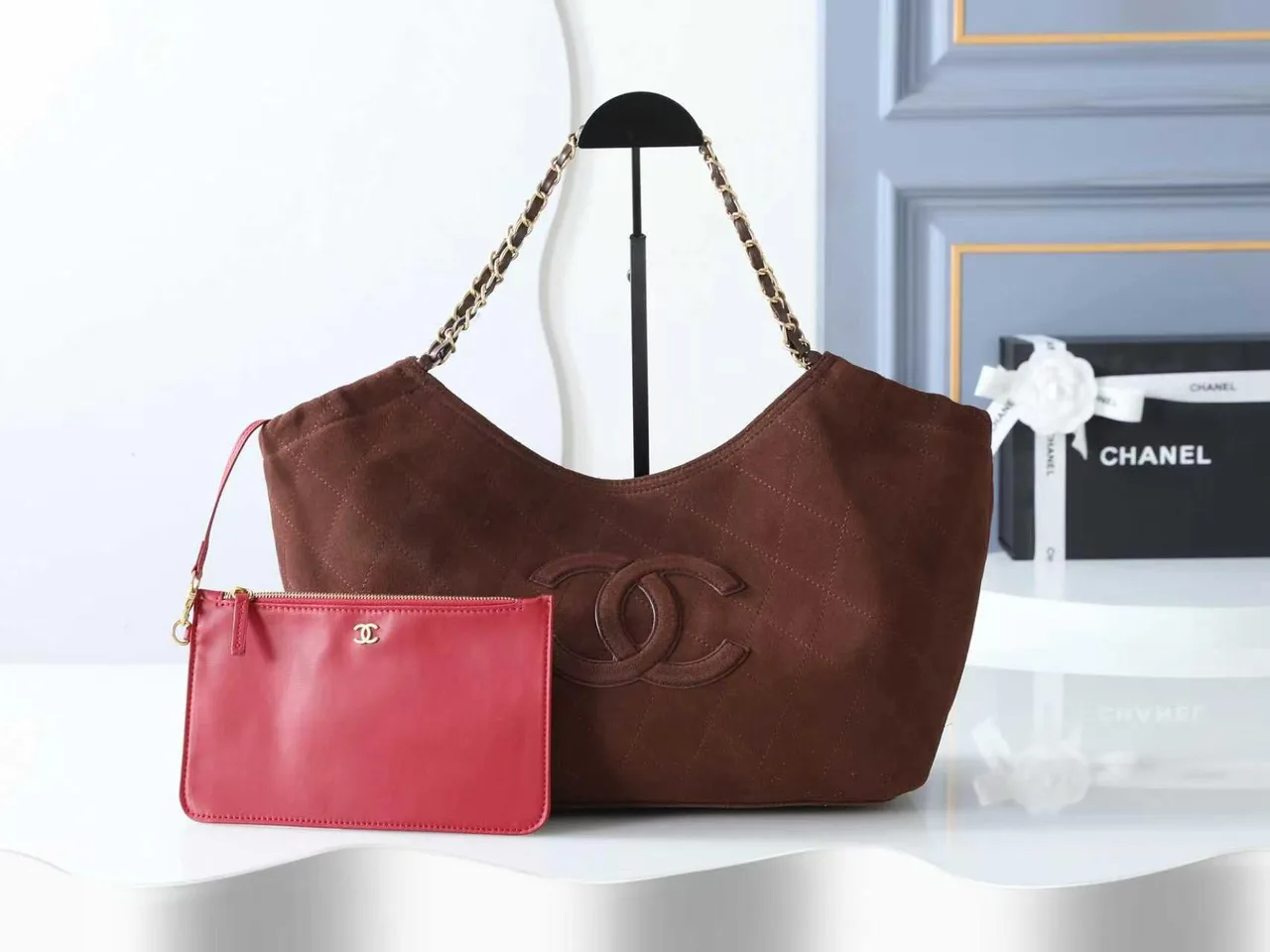 Chanel Quilted Suede-Look Hobo Bag in Brown · view 1