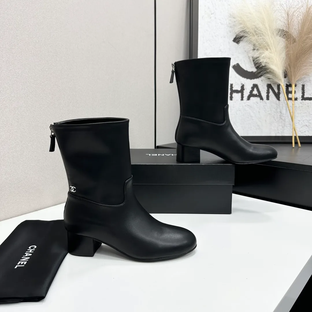 Chanel Cowhide Ankle Boots in Black · view 8