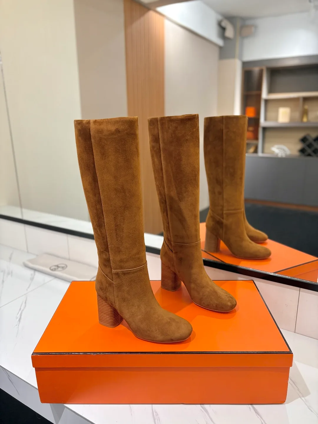 Hermes Cowhide Knee-High Boots in Brown · view 1
