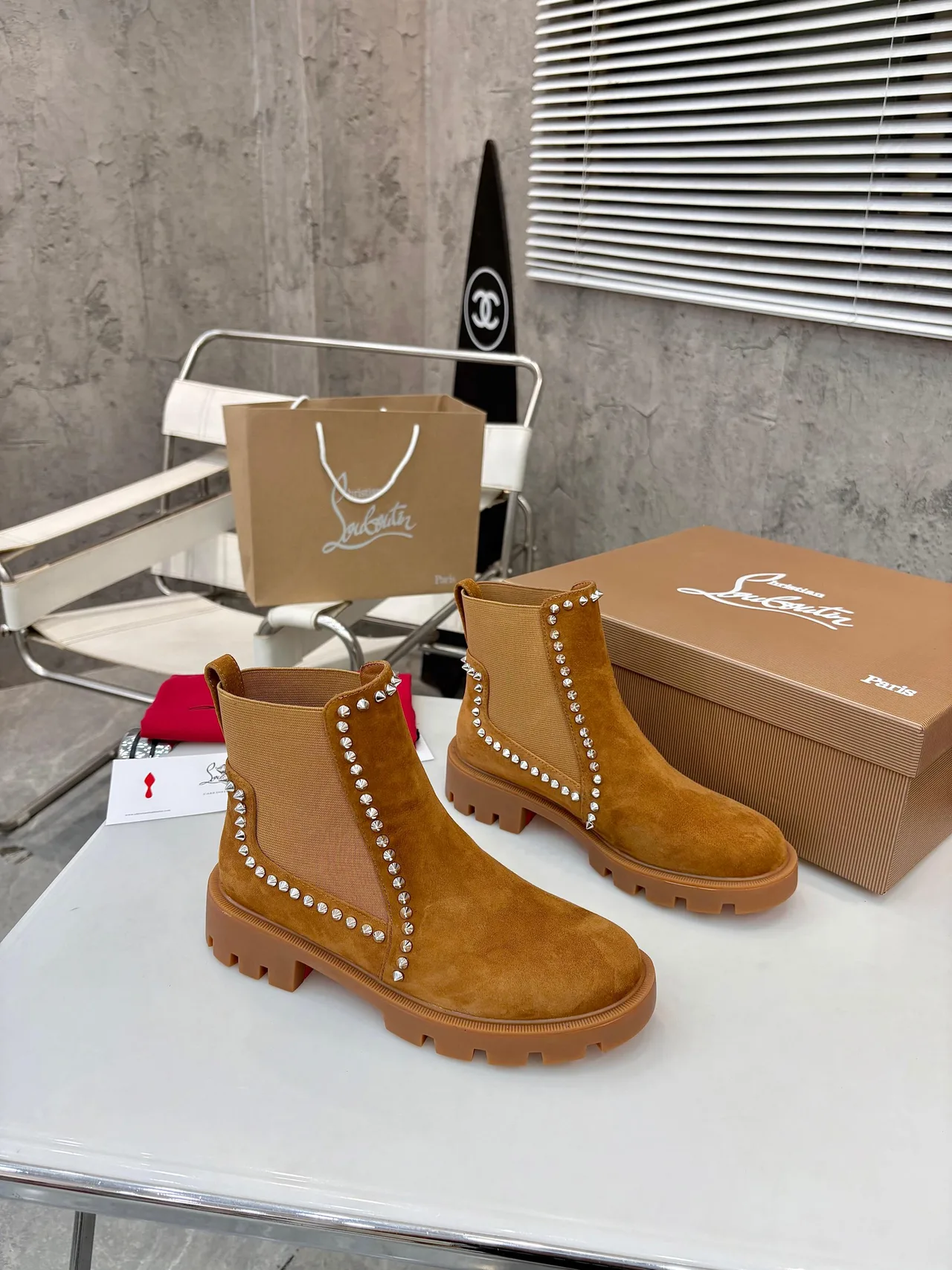 Christian Louboutin Stud-trim ankle boots in Black & Tan · view 8